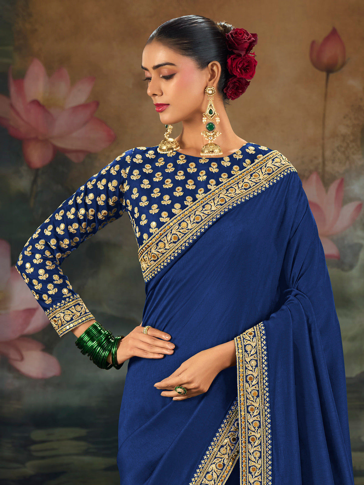 Blue munga silk plain saree with rich embellished border