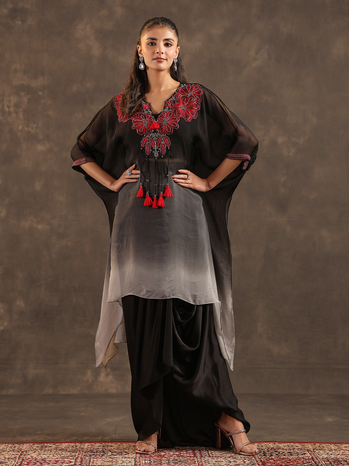 Black ombre organza kaftan suit with heavy festive embellishments