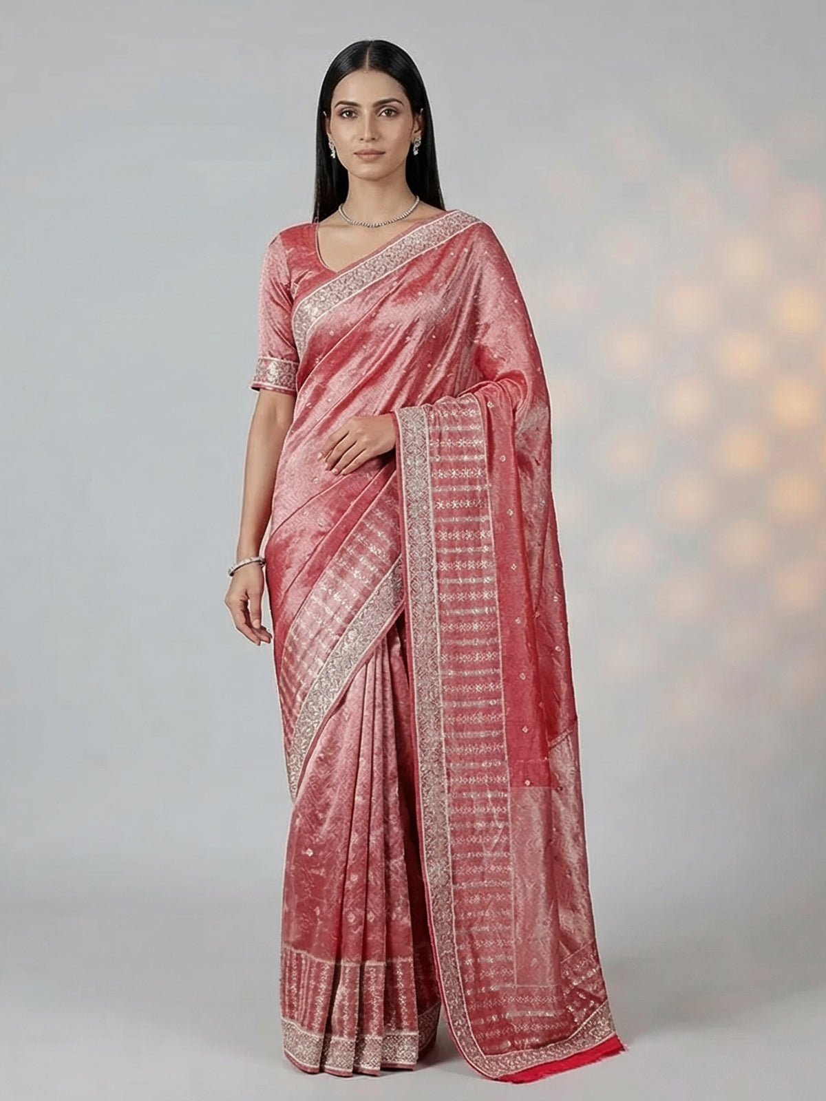 Maroon tissue saree with zardosi and cutdana work