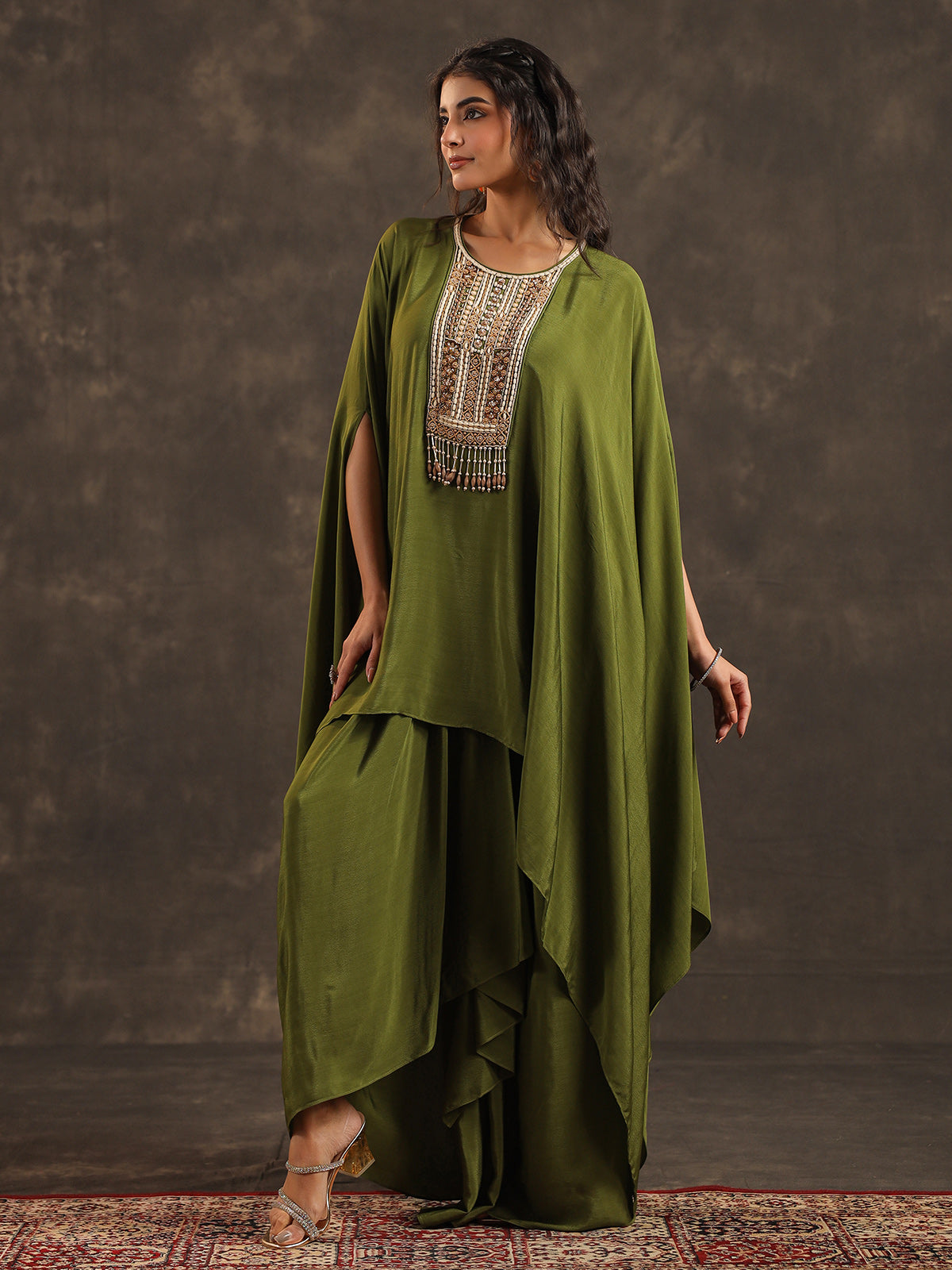 Mehendi green viscose crepe kaftan suit with festive embellishments