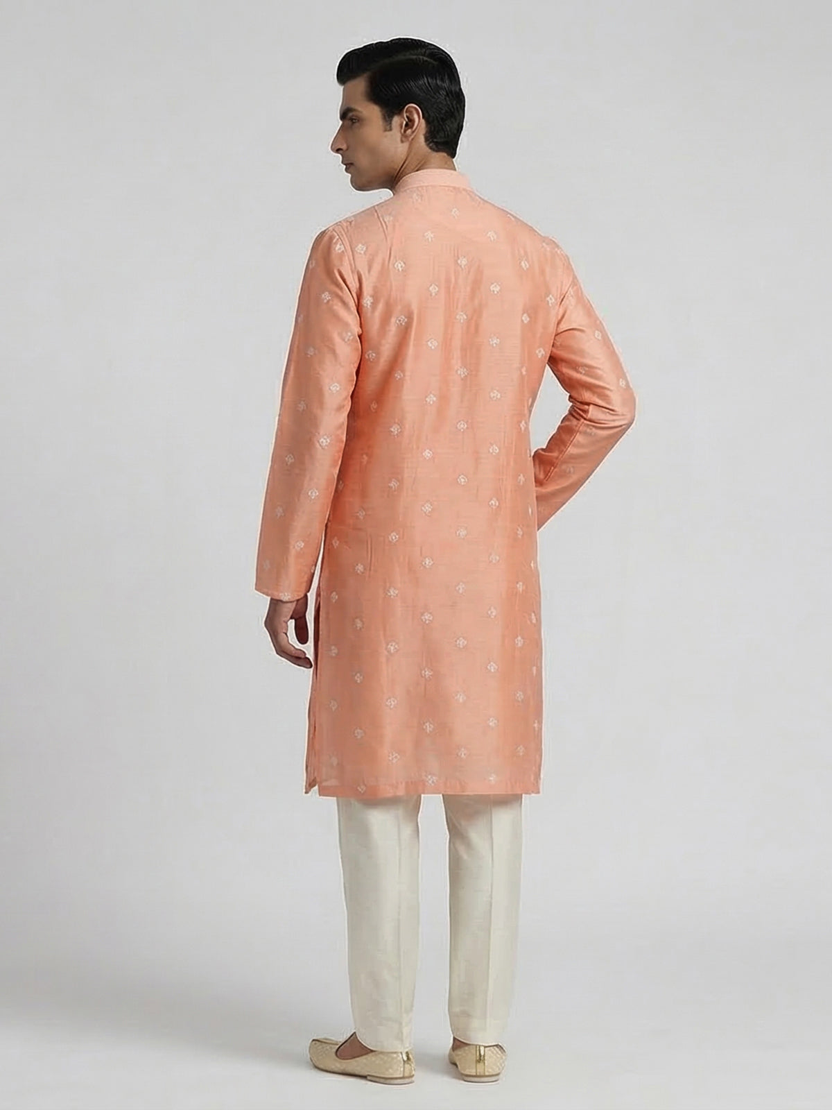 Peach cotton embroidered kurta suit with festive sequin detailing
