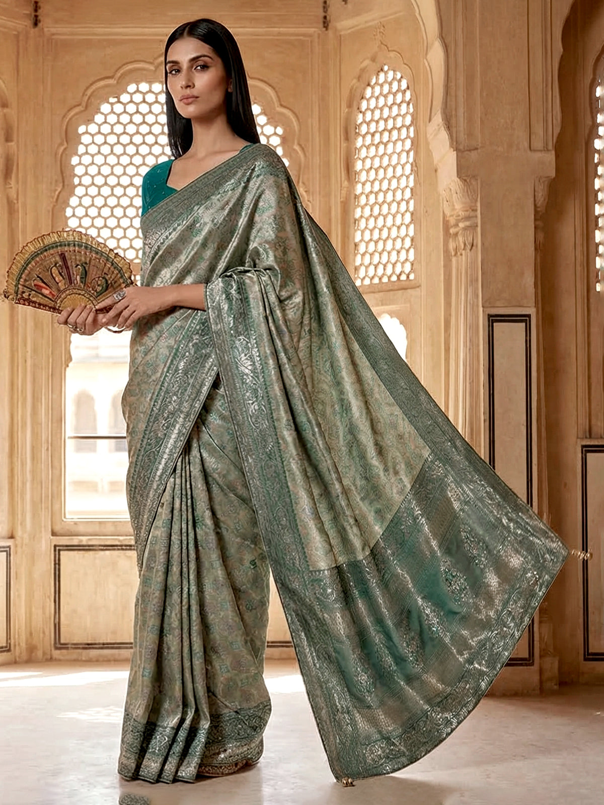 Beige and rama blue art tissue silk saree with contrast border