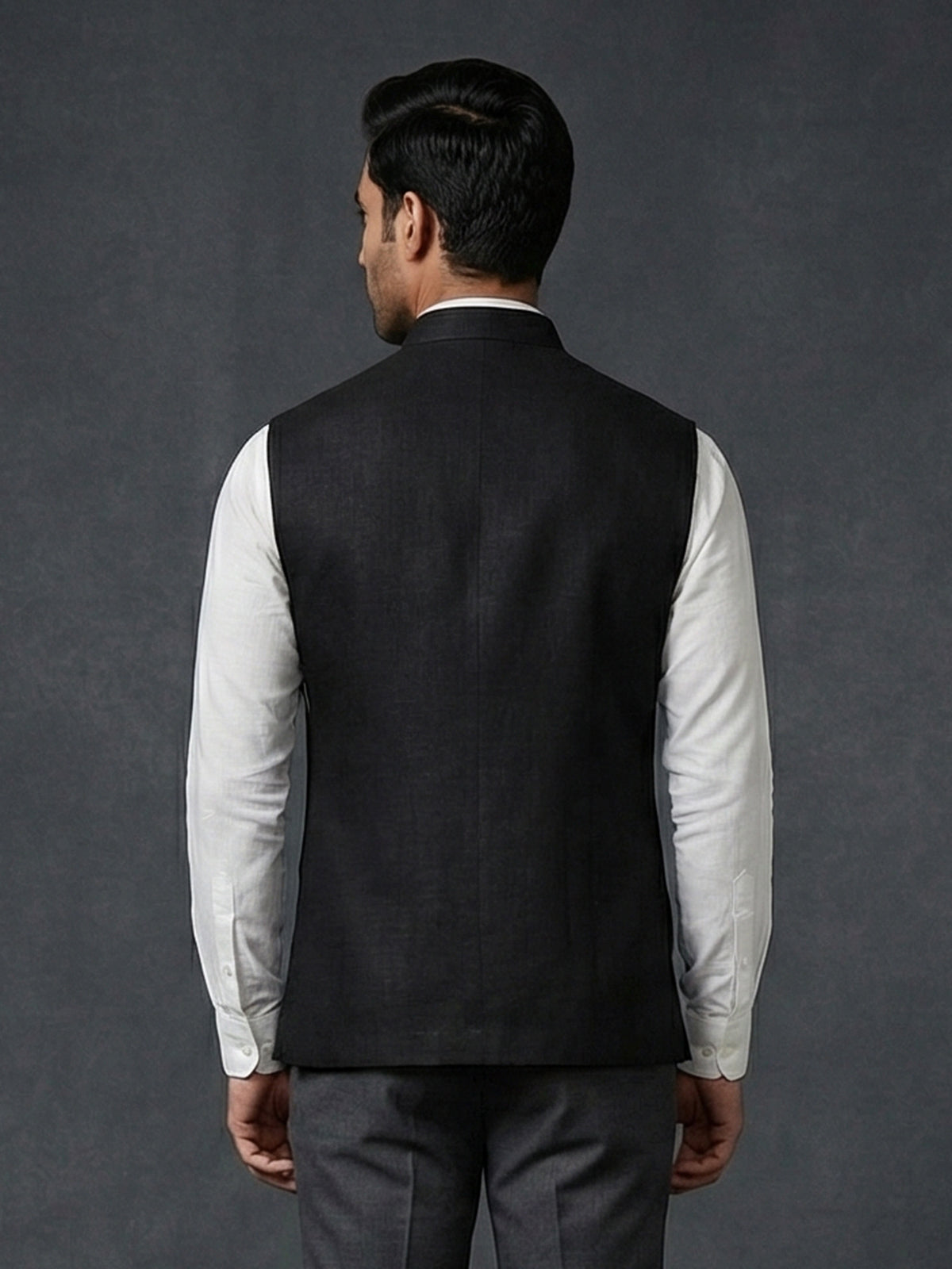 Black cotton embellished waistcoat with brooch for festive