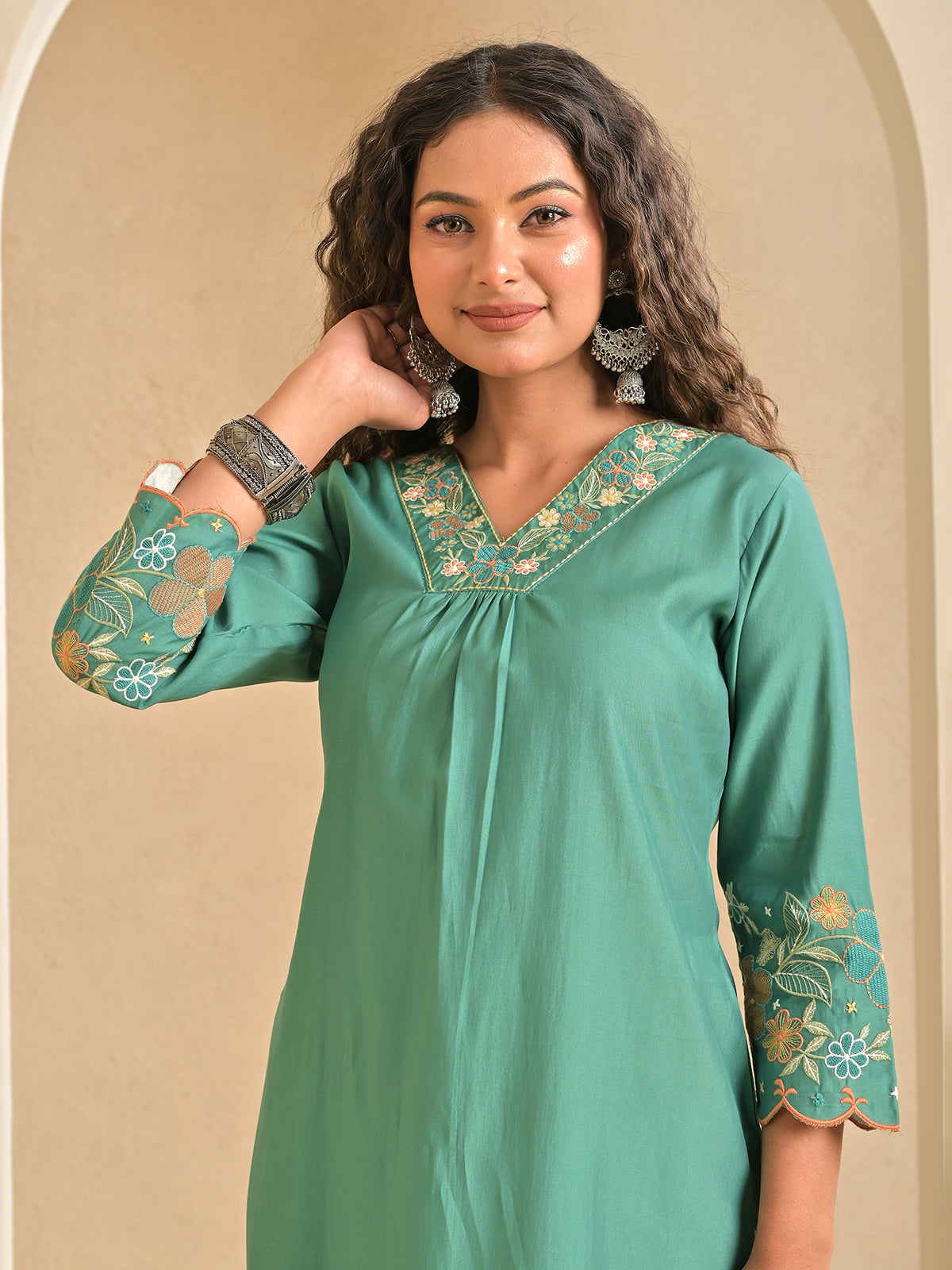 Light green silk embroidered v neck casual kurti