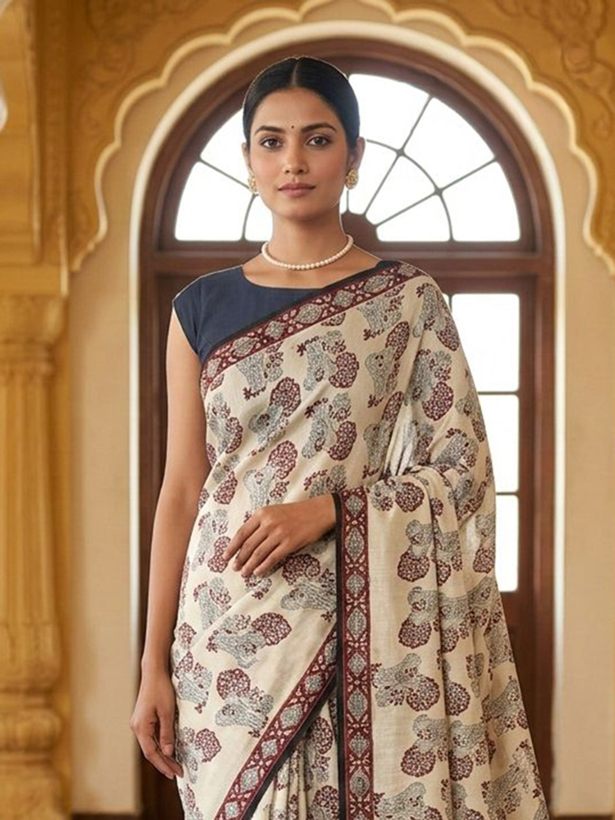 Off white printed muslin saree with unstitched blouse