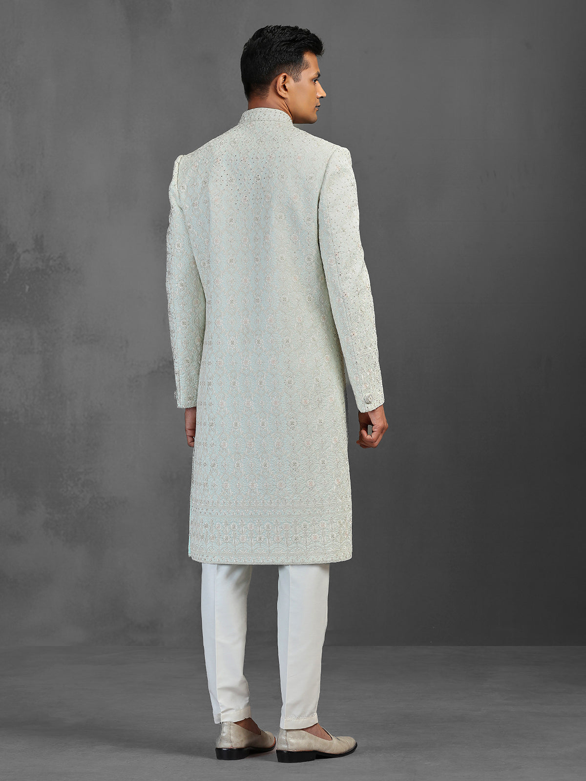 Light pista silk sherwani with thread and stone detailing