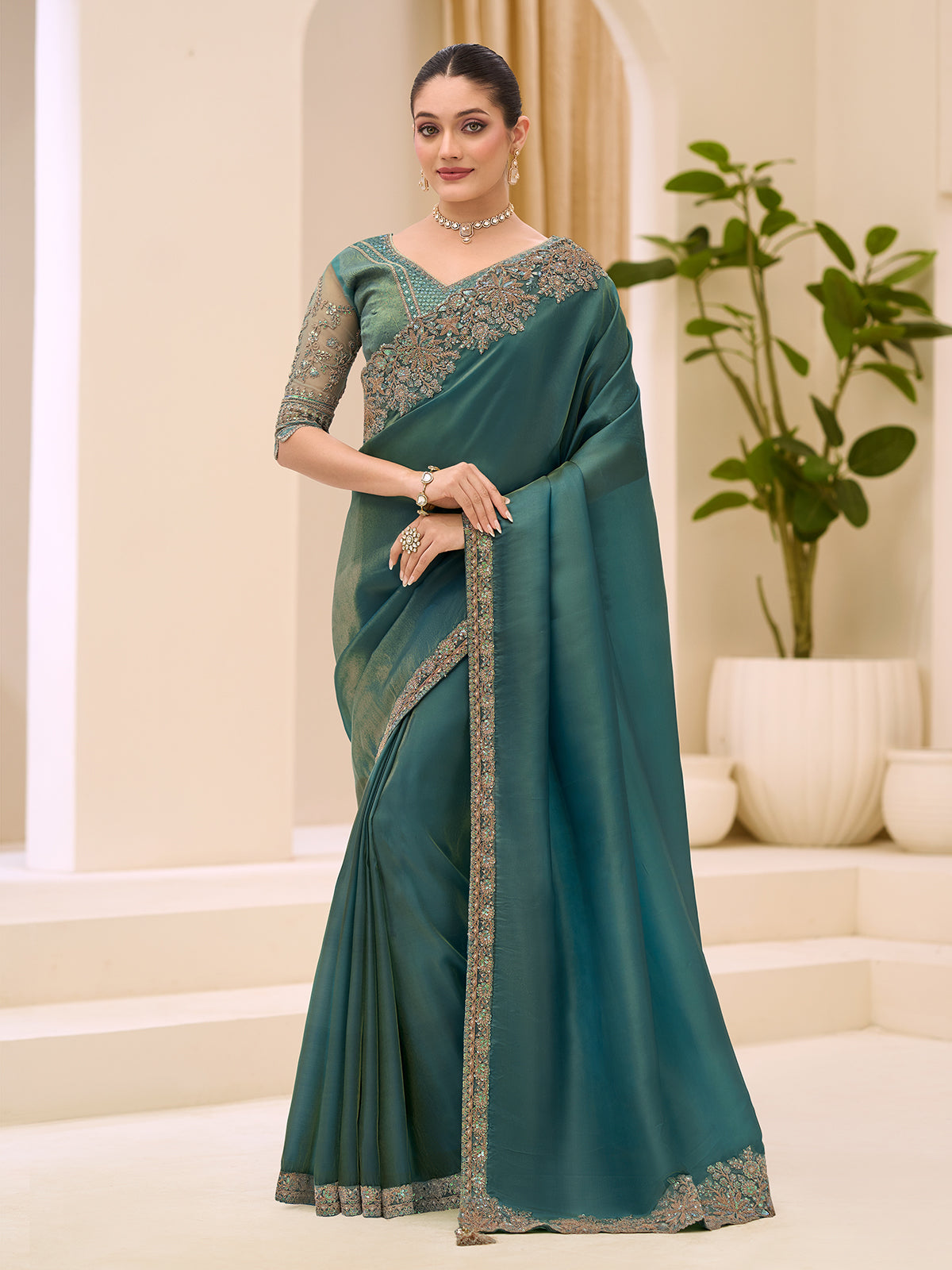 Rama green wedding tissue saree for festive celebration
