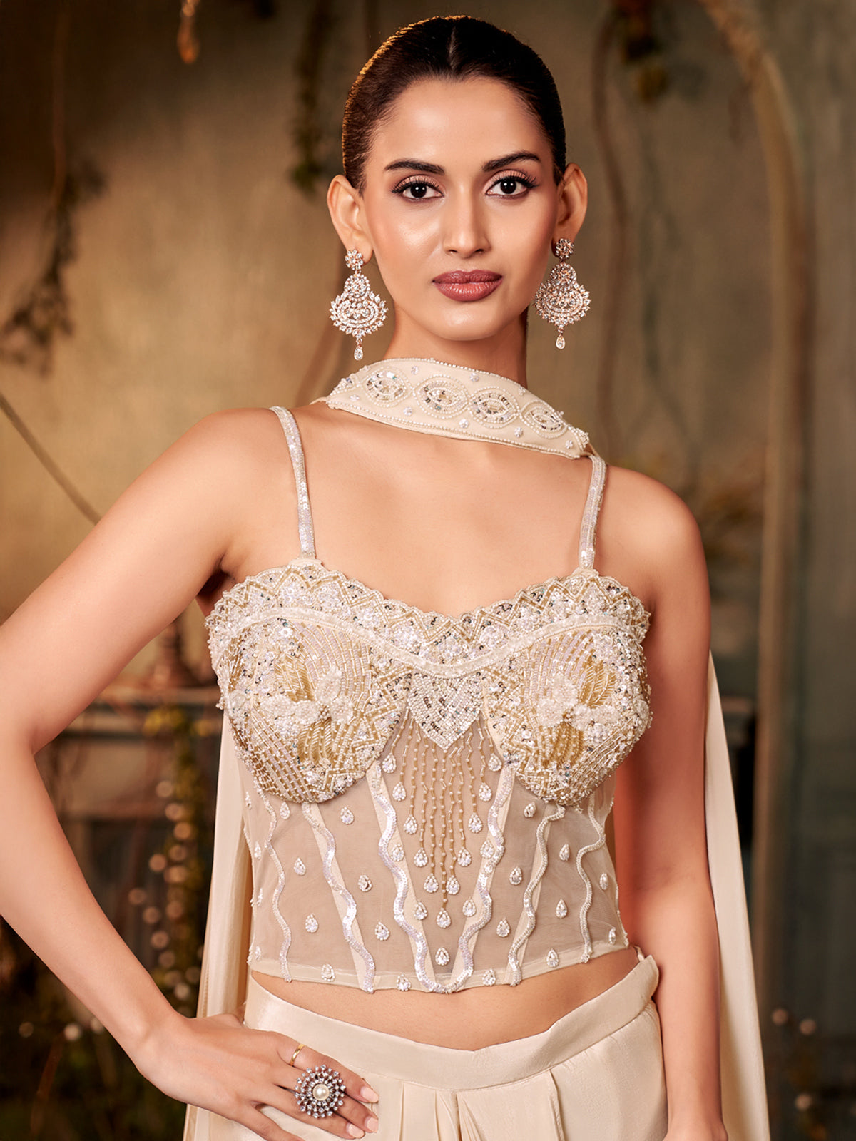 Beige crepe silk cutdana worked lehenga choli