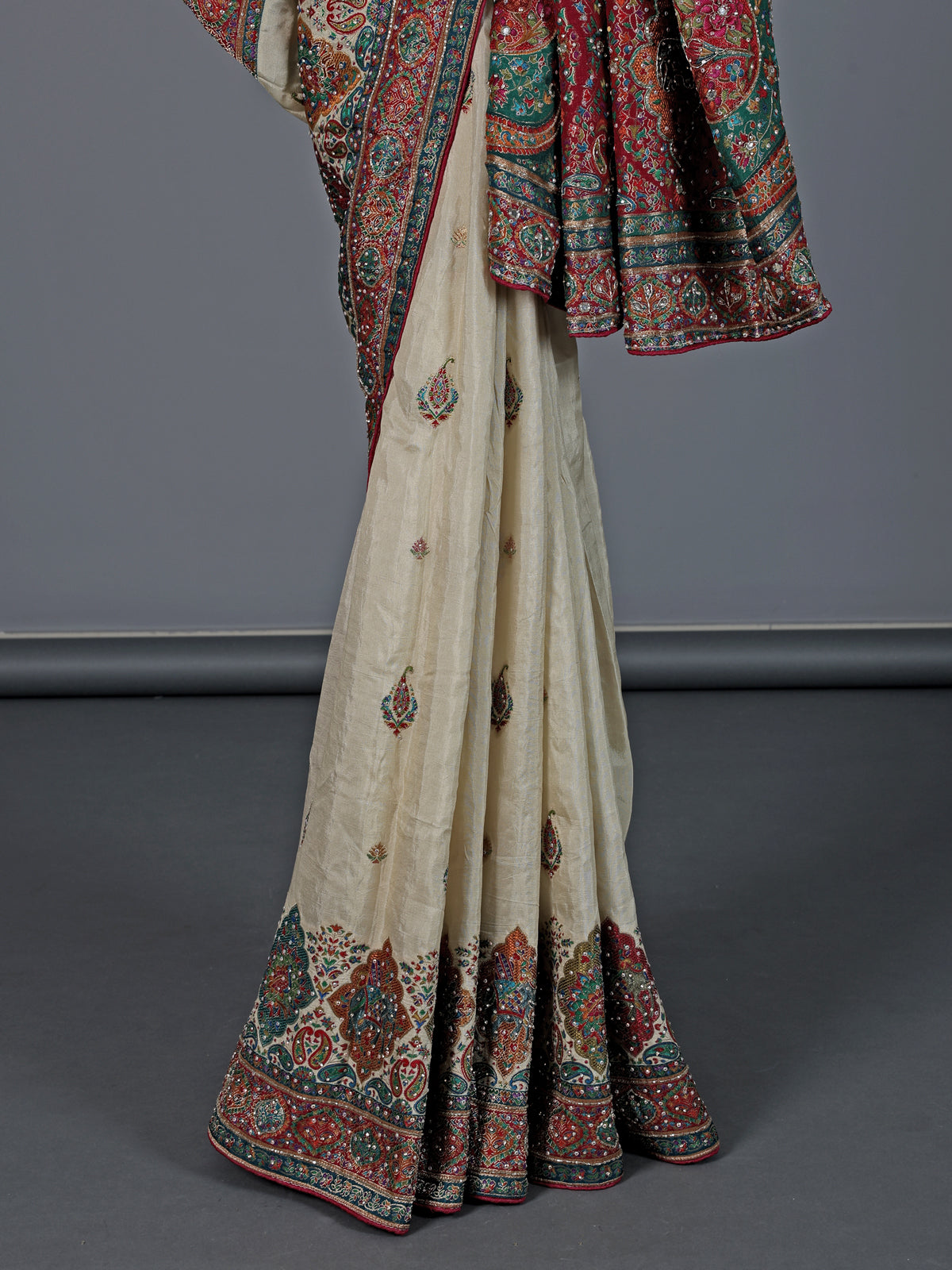Cream silk colorful motif festive wear saree