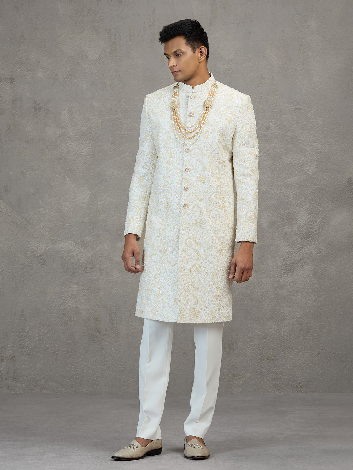 Off white satin silk sherwani with resham detailing