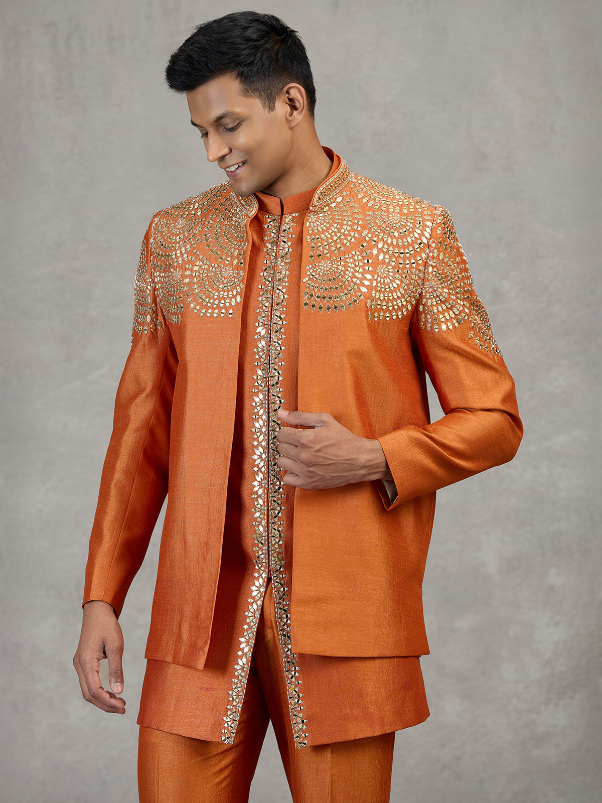 Orange silk wedding wear Indowestern set with mirror work