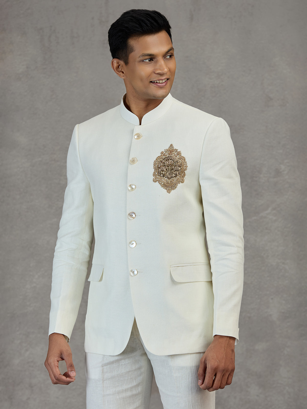 Ivory white wedding jodhpuri suit with metallic detailing