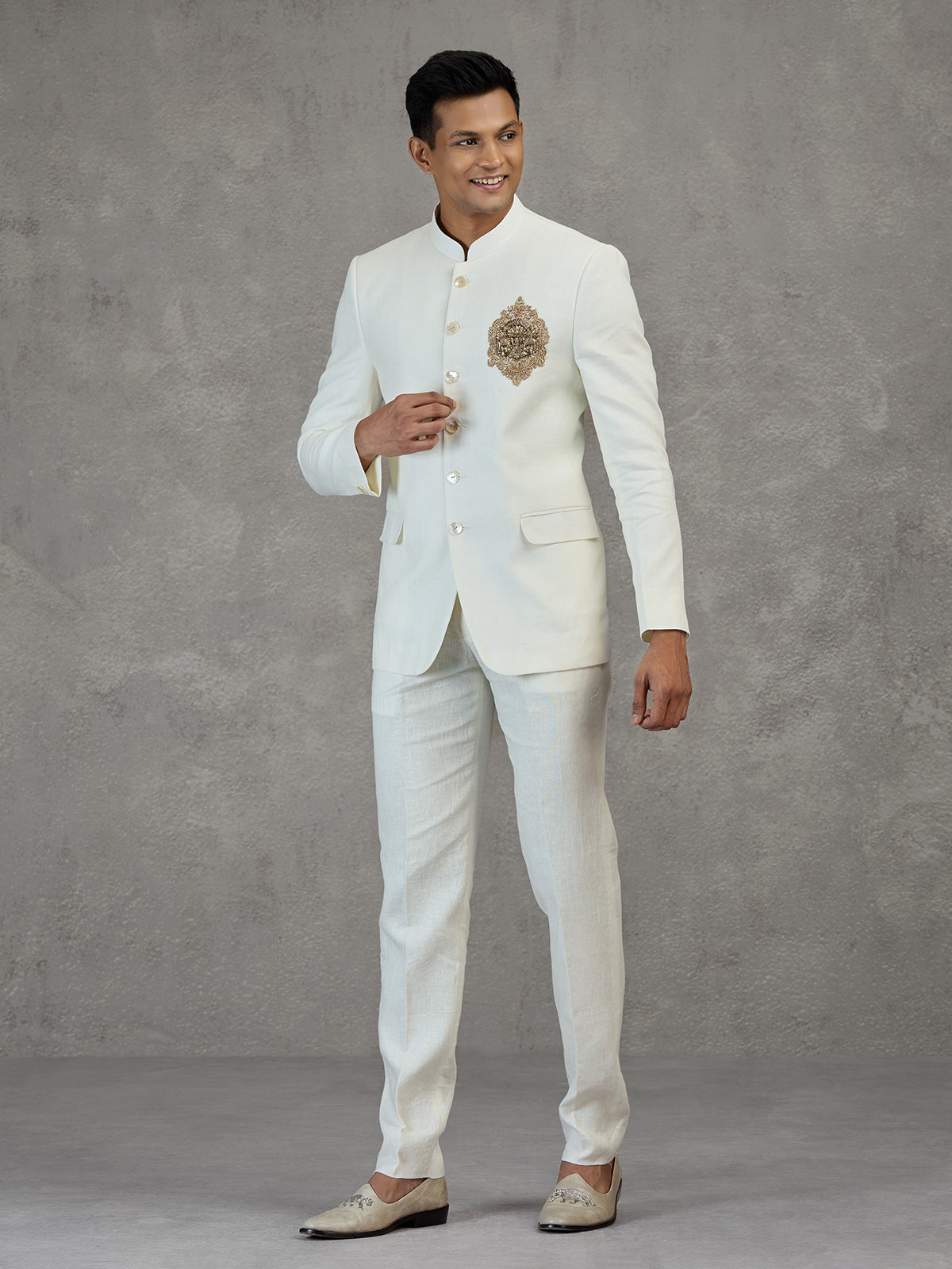 Ivory white wedding jodhpuri suit with metallic detailing