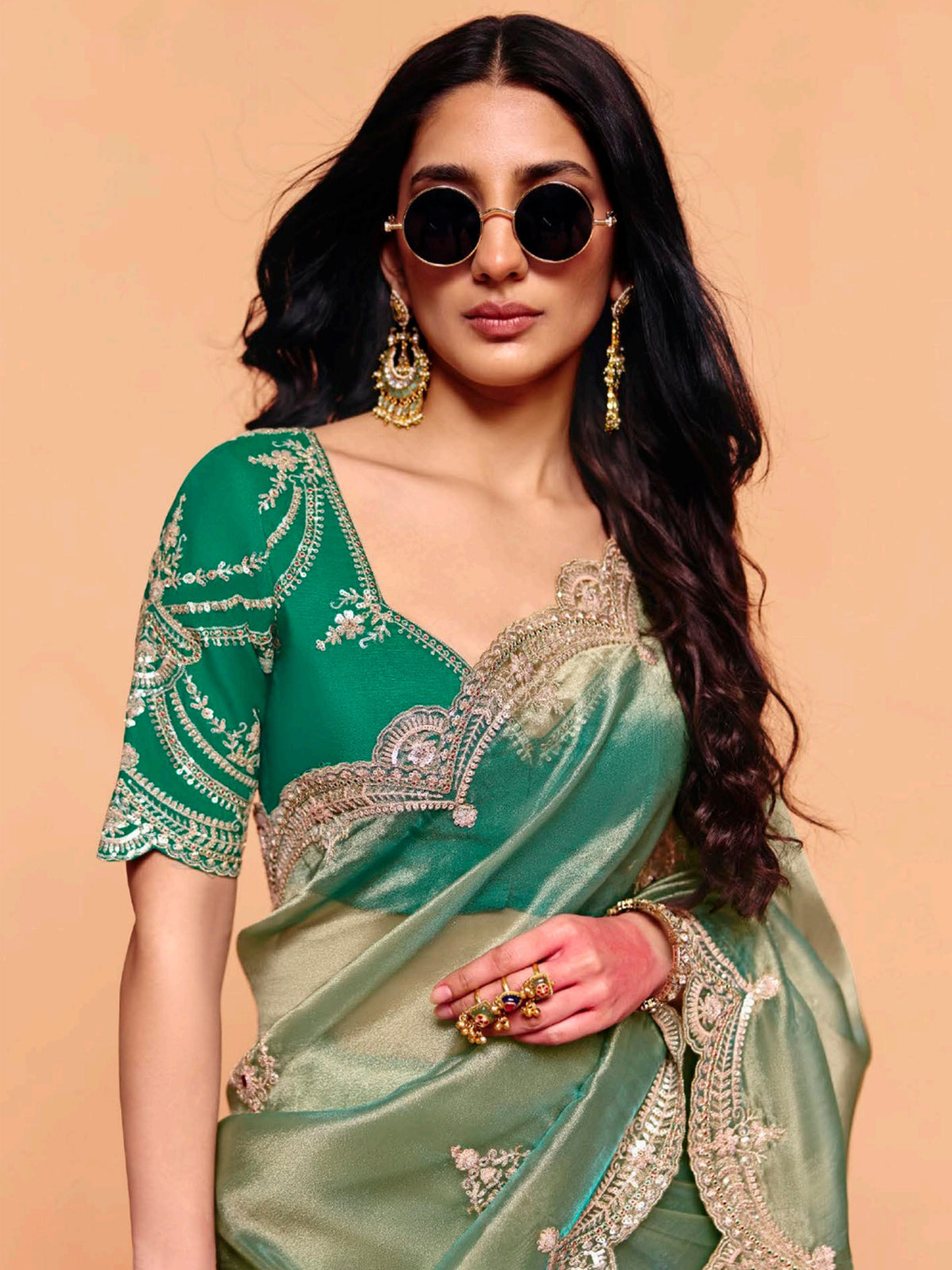 Pastel pista green tissue silk festive wear saree