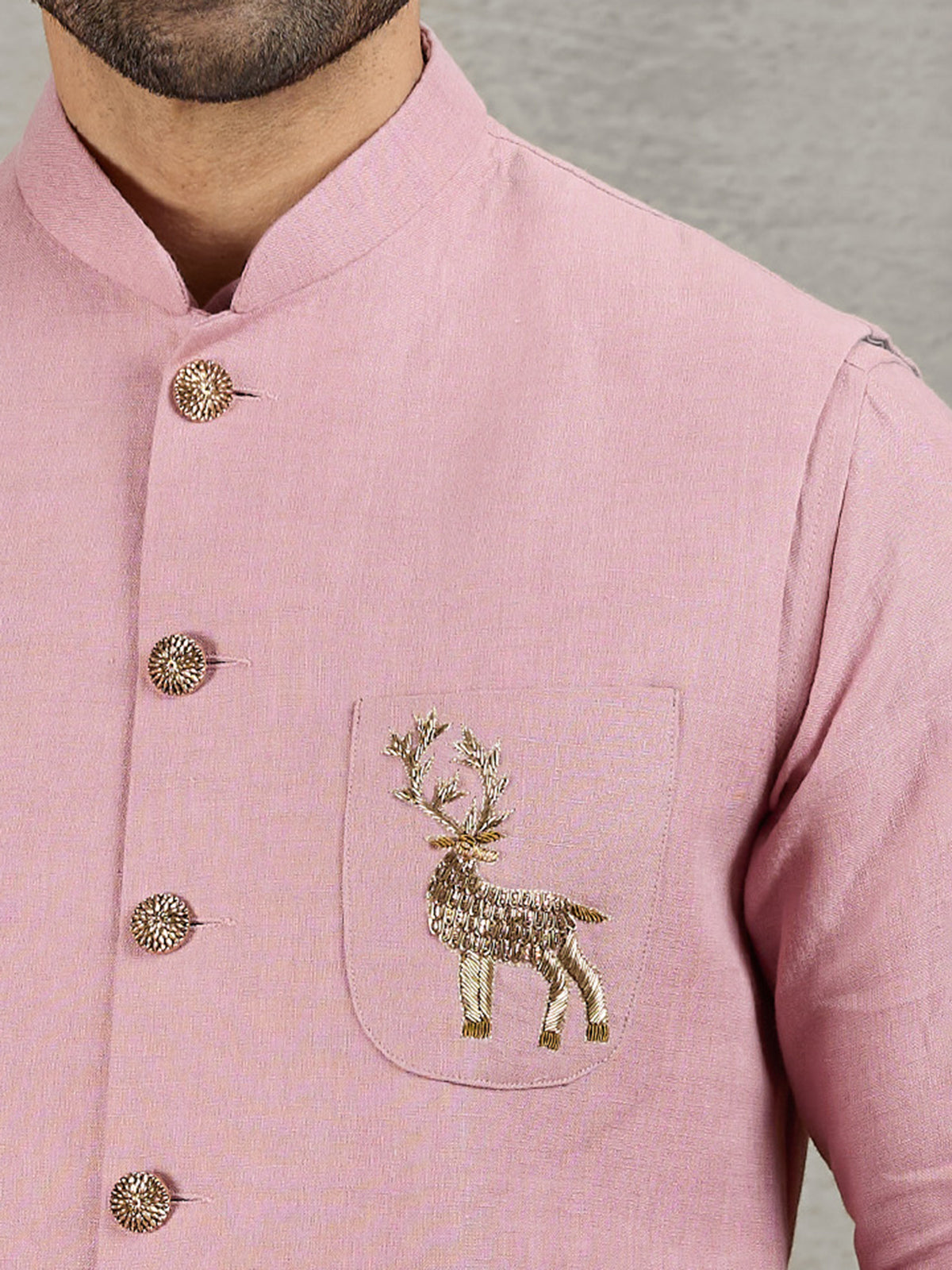 Pastel pink linen waistcoat set with embellished crest detail