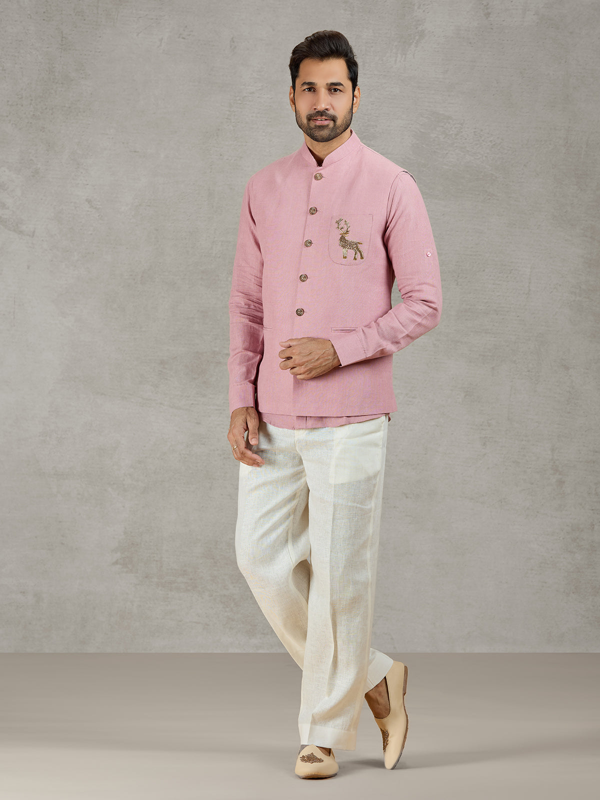 Pastel pink linen waistcoat set with embellished crest detail