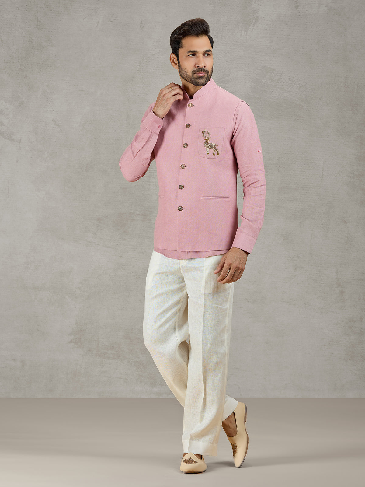 Pastel pink linen waistcoat set with embellished crest detail