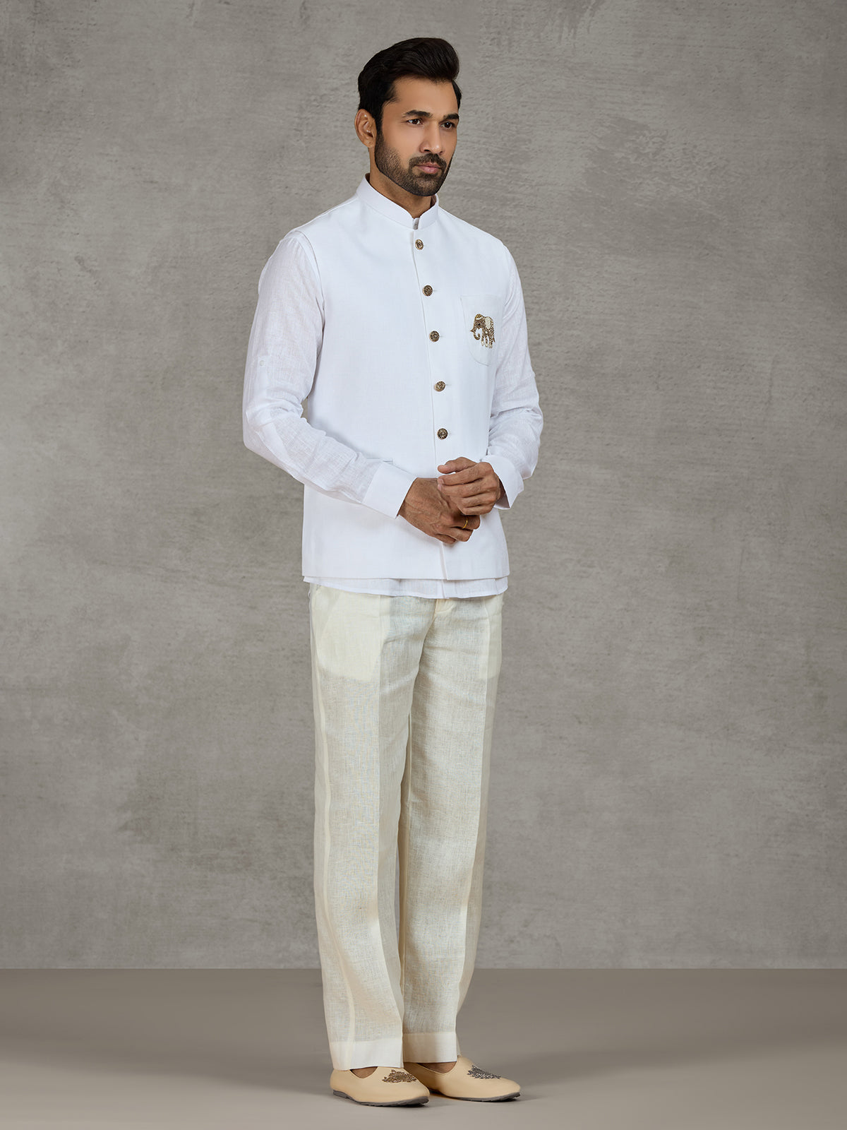 White linen waistcoat set with intricate zardosi work