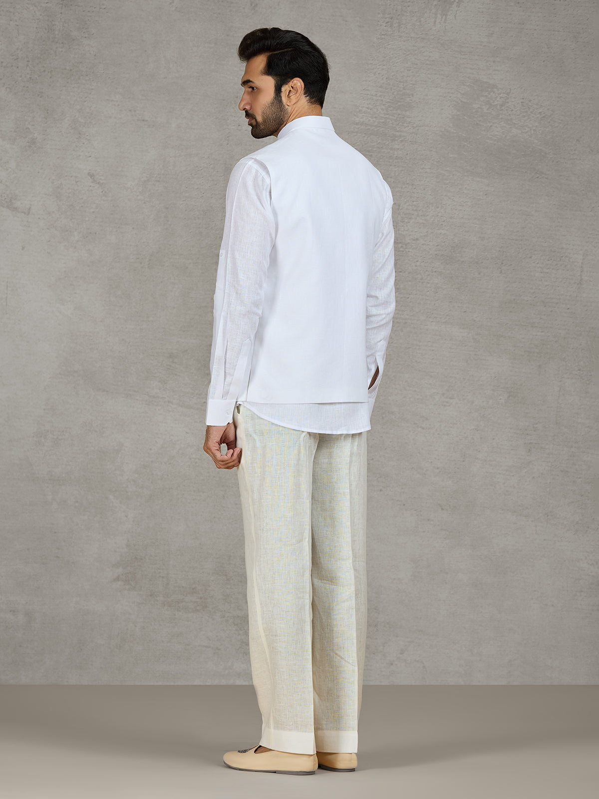 White linen waistcoat set with intricate zardosi work