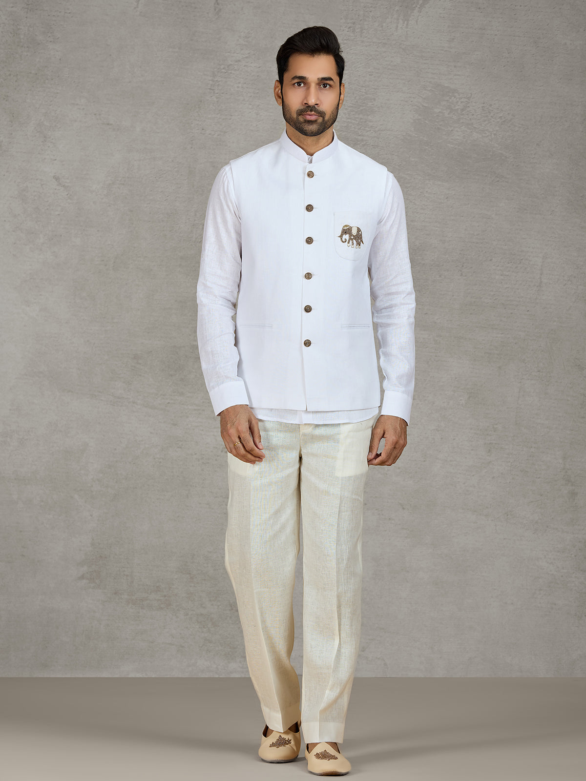 White linen waistcoat set with intricate zardosi work
