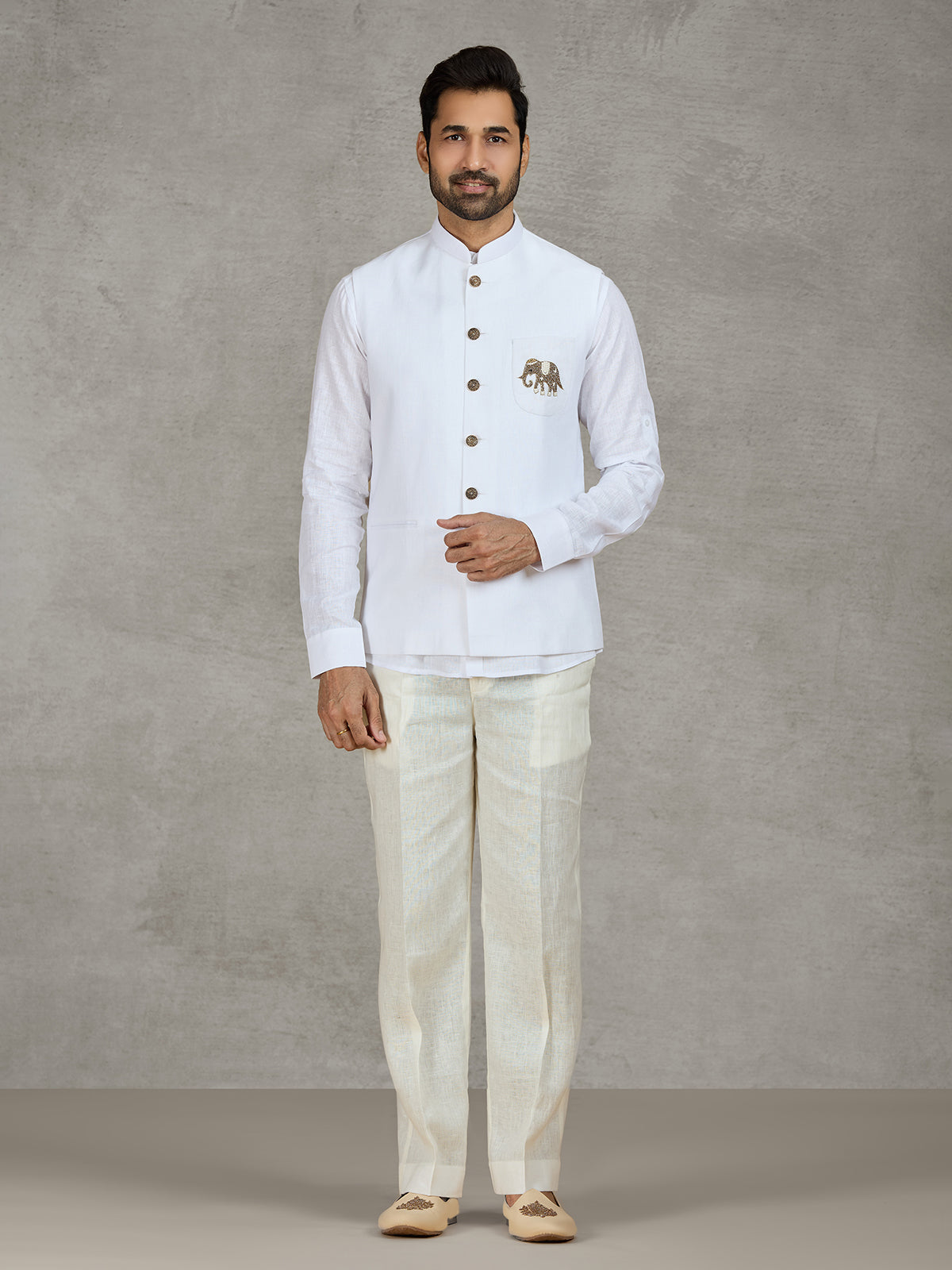 White linen waistcoat set with intricate zardosi work
