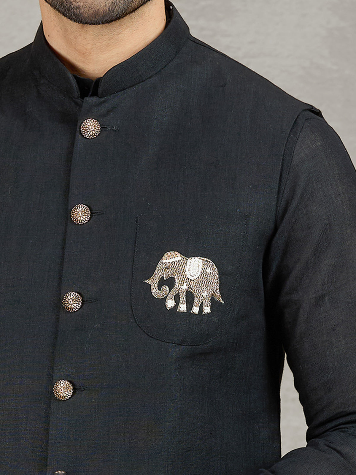 Black party wear linen waistcoat set with embellished crest