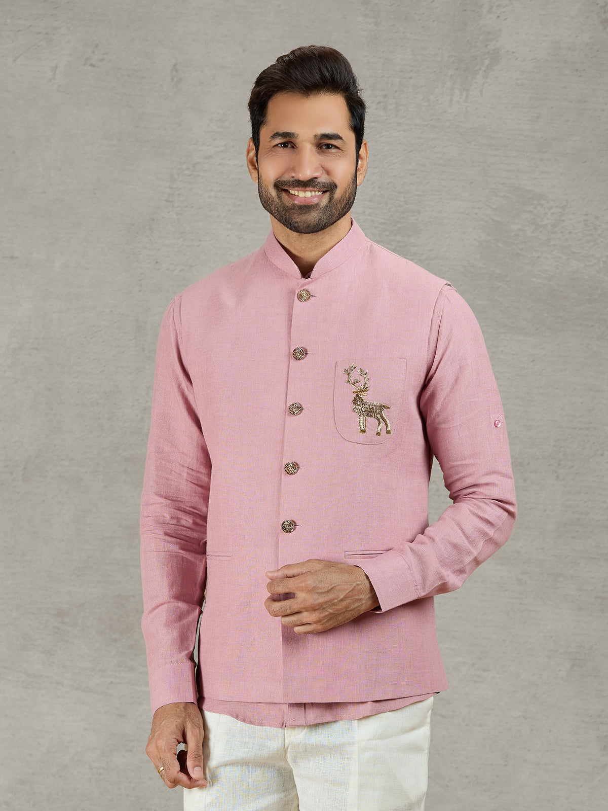 Pastel pink linen waistcoat with shirt and embellished crest detail