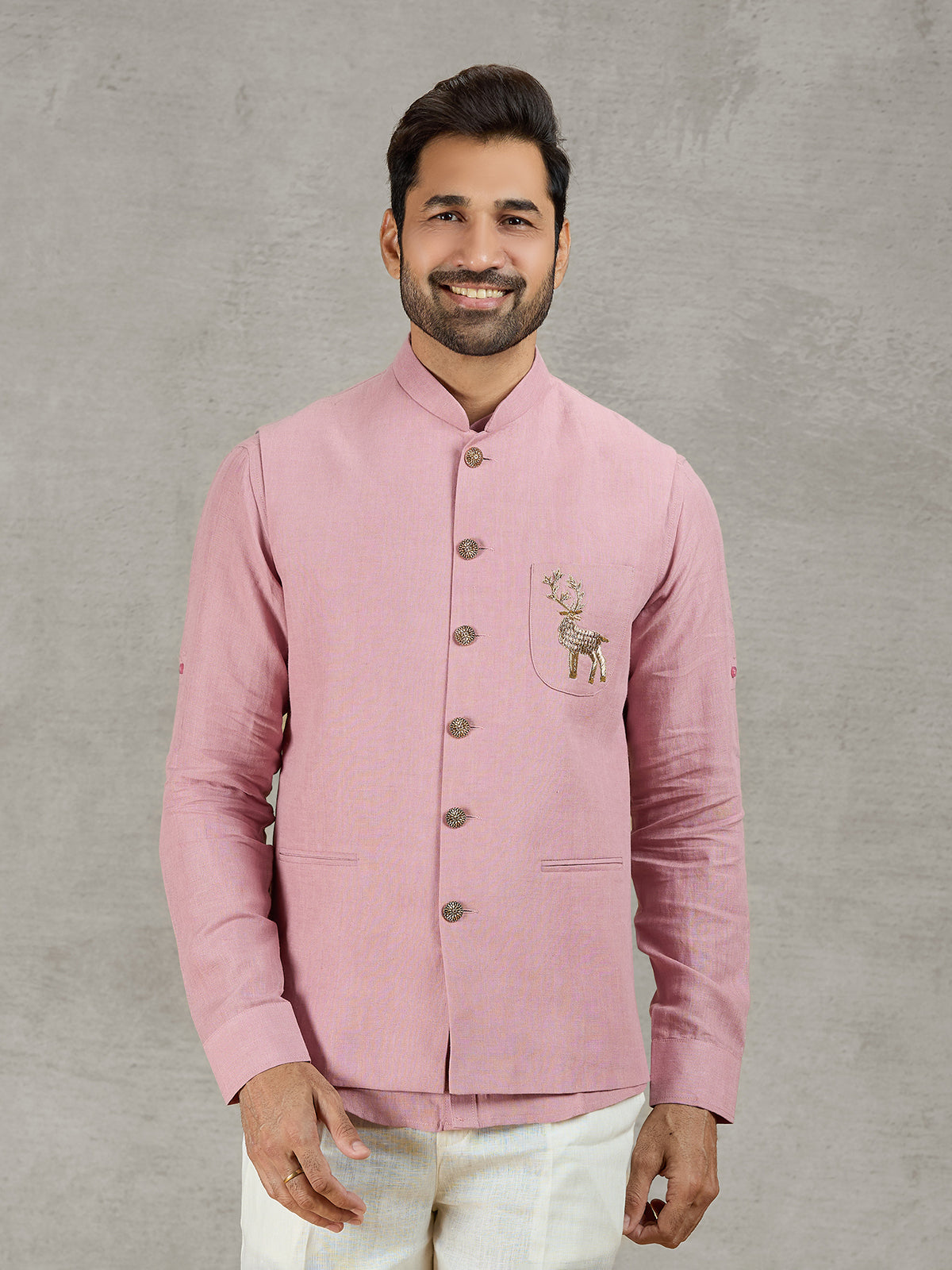 Pastel pink linen waistcoat with shirt and embellished crest detail