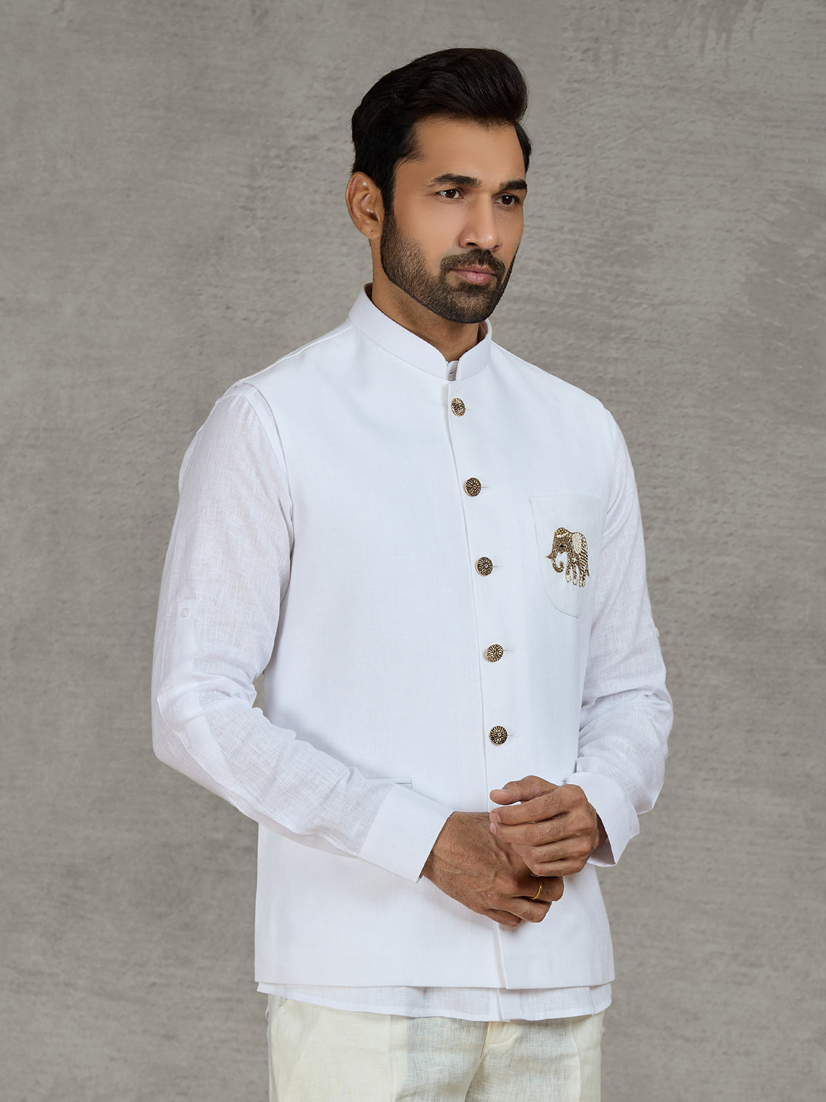 White linen waistcoat with shirt and intricate zardosi work