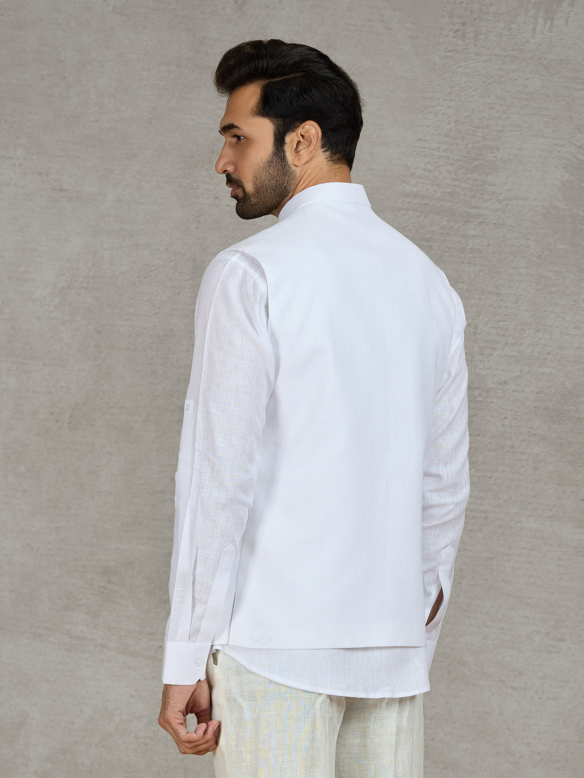White linen waistcoat with shirt and intricate zardosi work