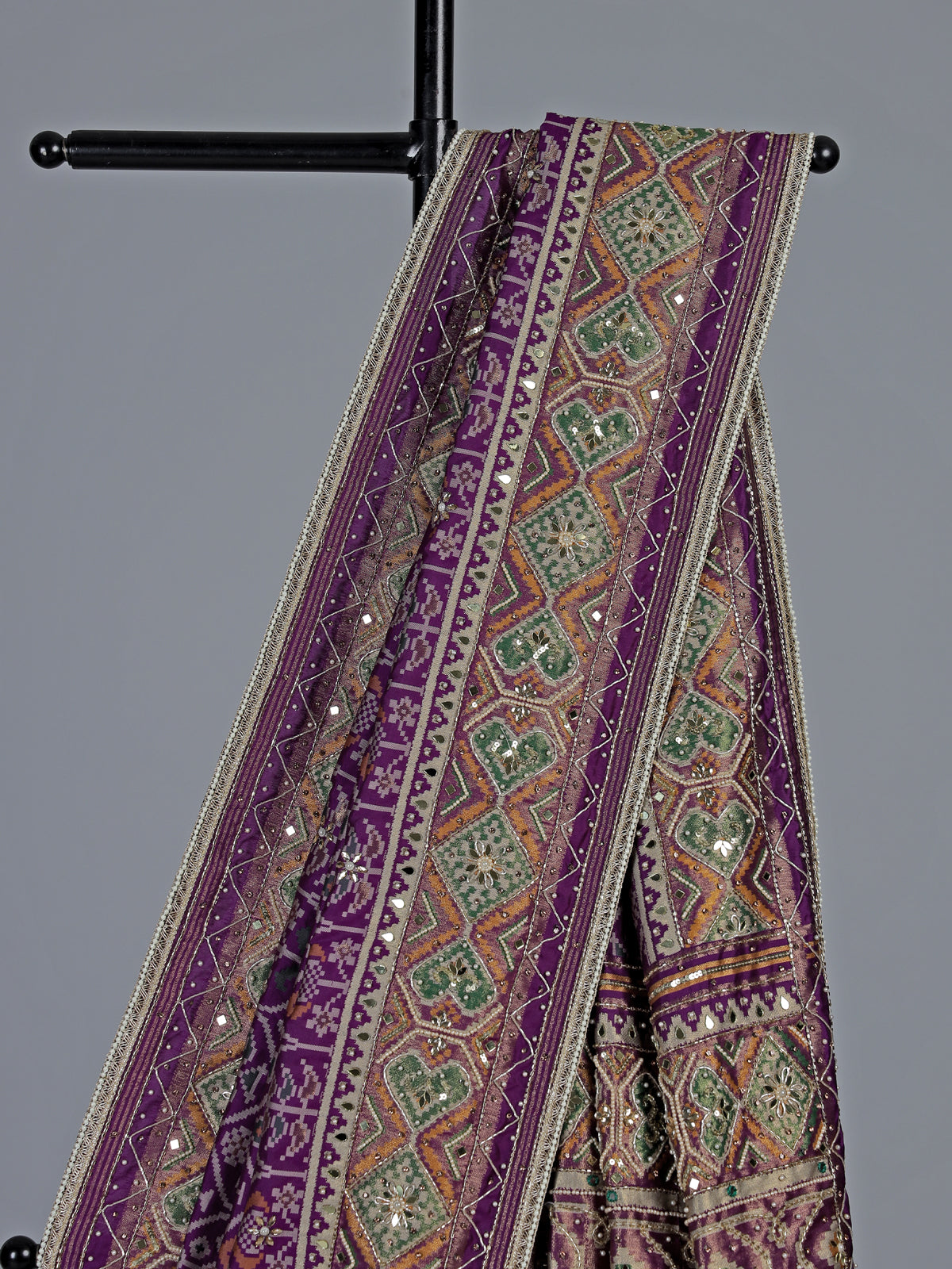 Regal purple art patola silk saree with embellished geometric weave