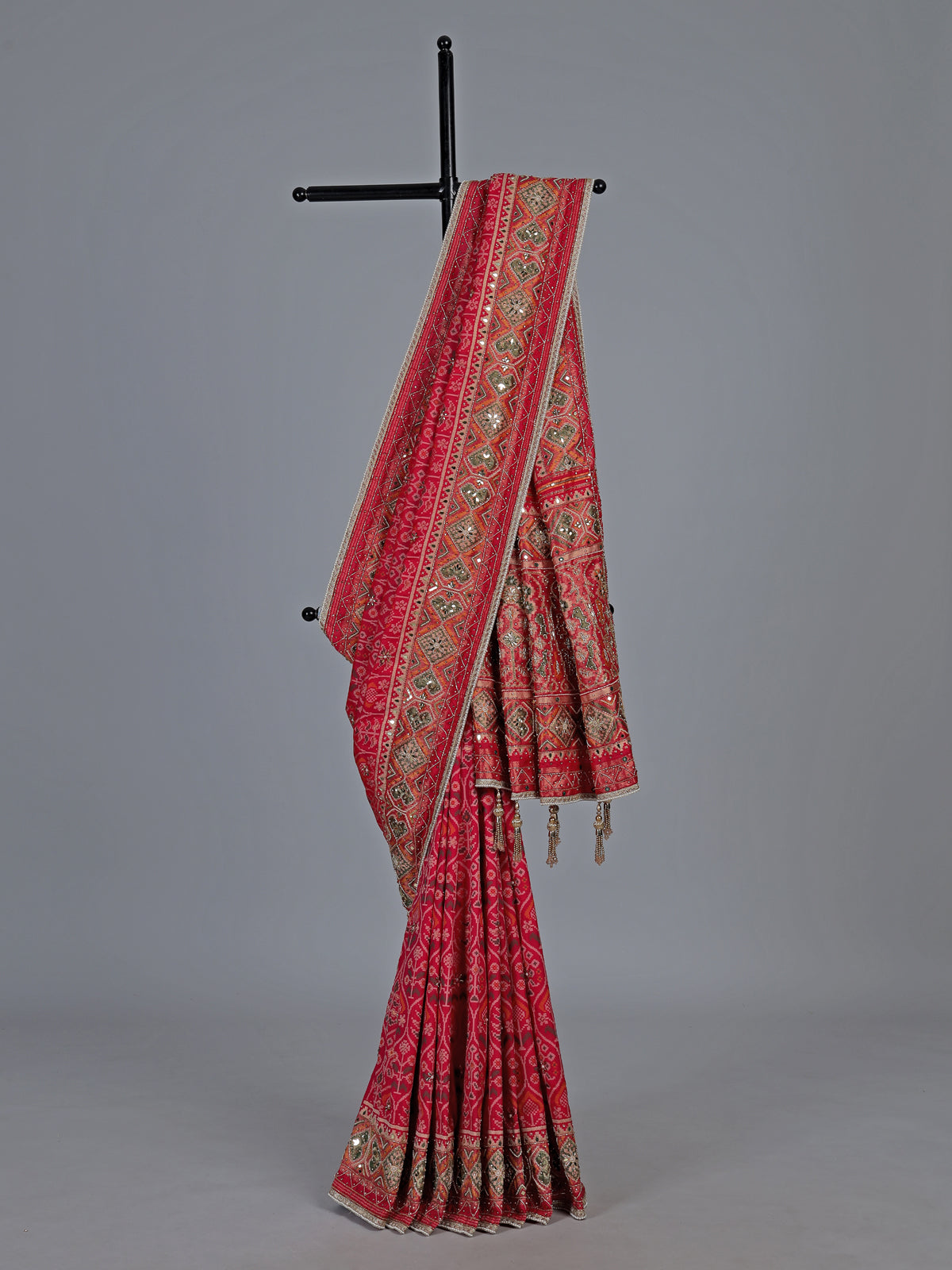 Rani pink art patola silk saree with radiant embellishments