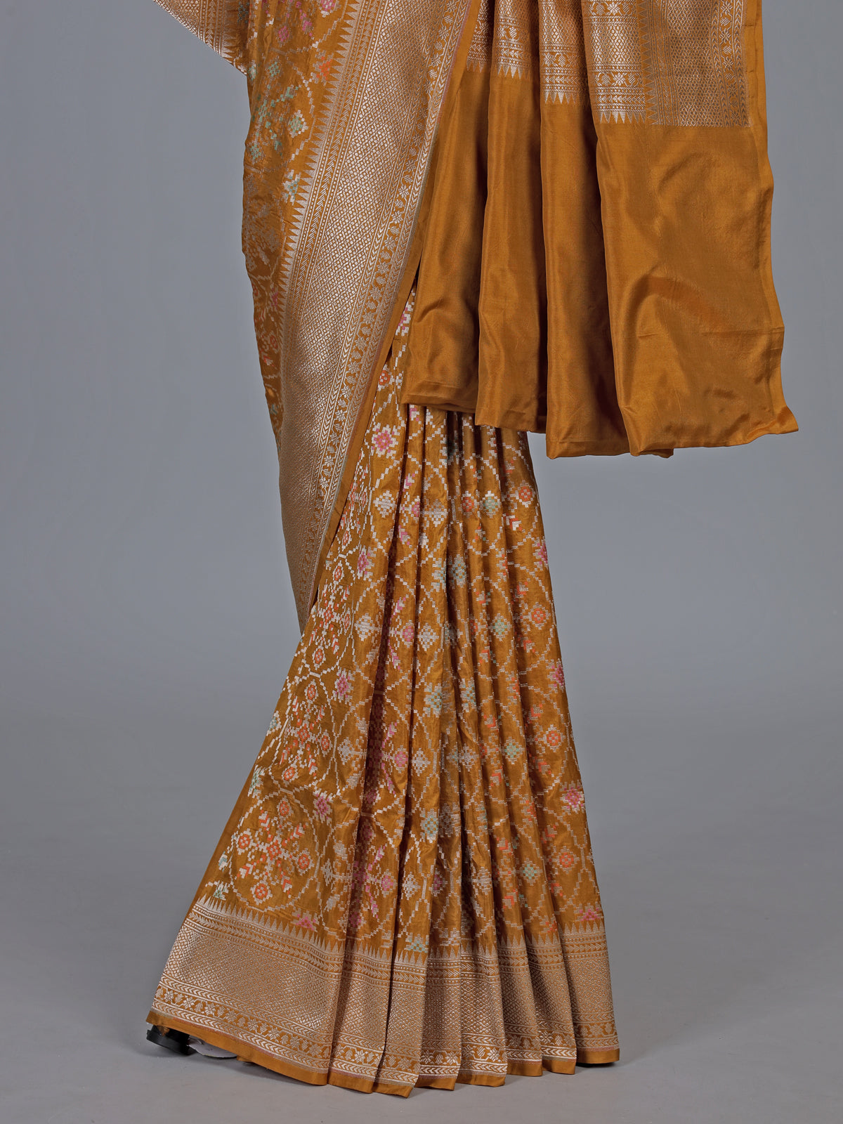 Mustard yellow banarasi silk saree with meenakari zari elegance