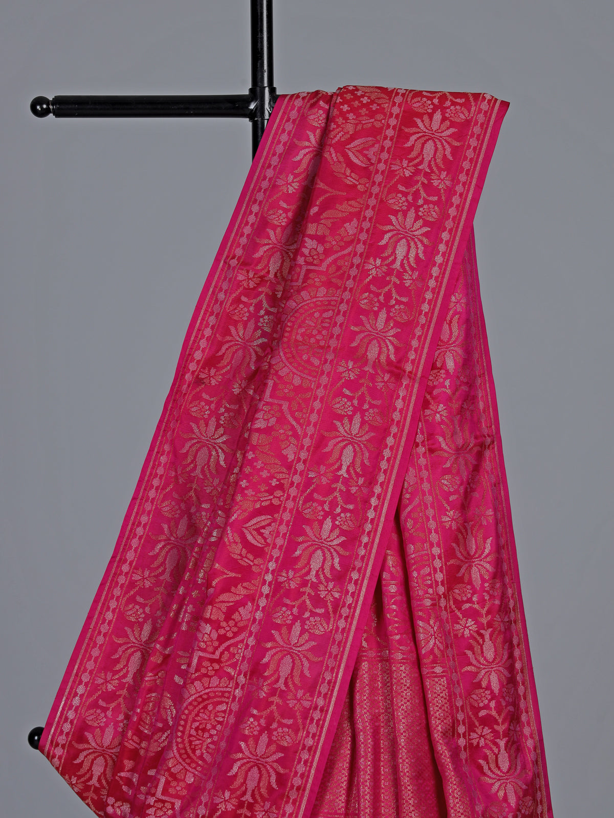 Rani pink banarasi silk saree with floral zari artistry
