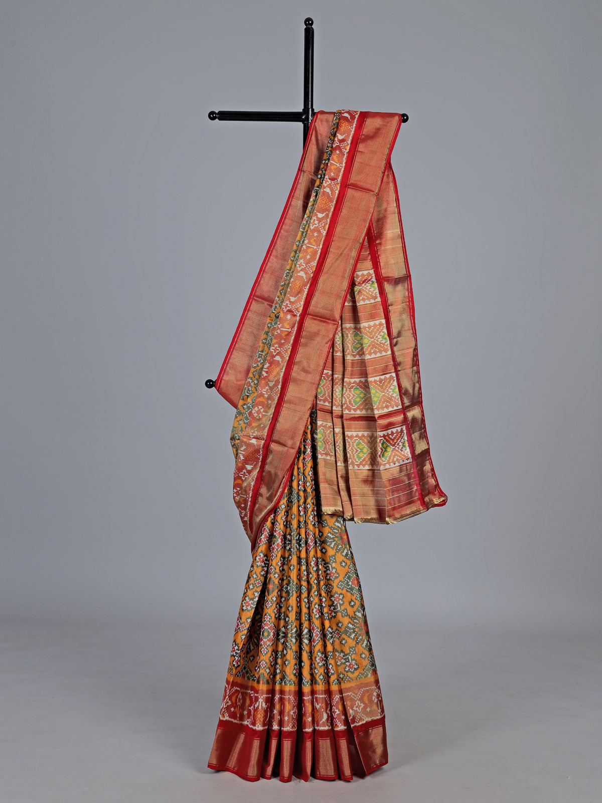 Yellow hyderabadi patola silk saree with double ikat motifs