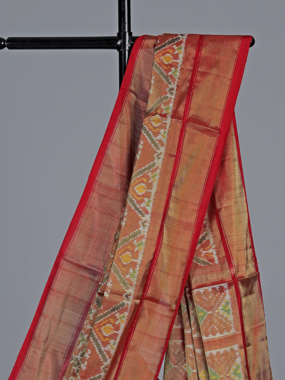 Light brown hyderabadi patola silk saree with heritage motifs