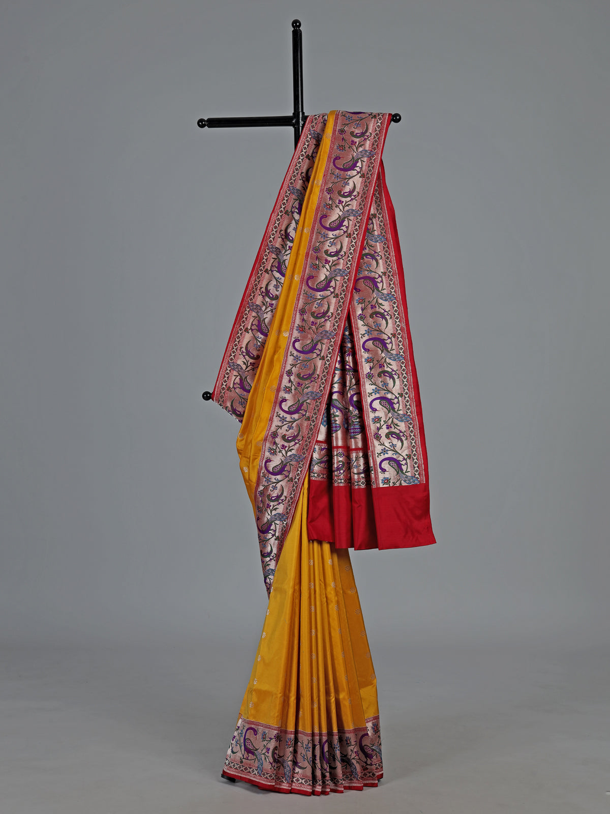 Mustard yellow banarasi silk saree with peacock zari border