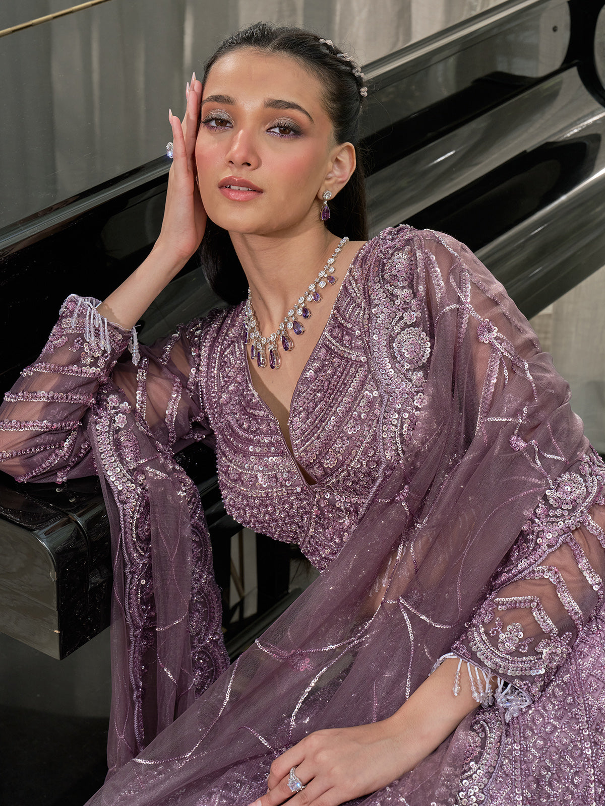 Dusty lavender net designer lehenga choli with cutdana and beads