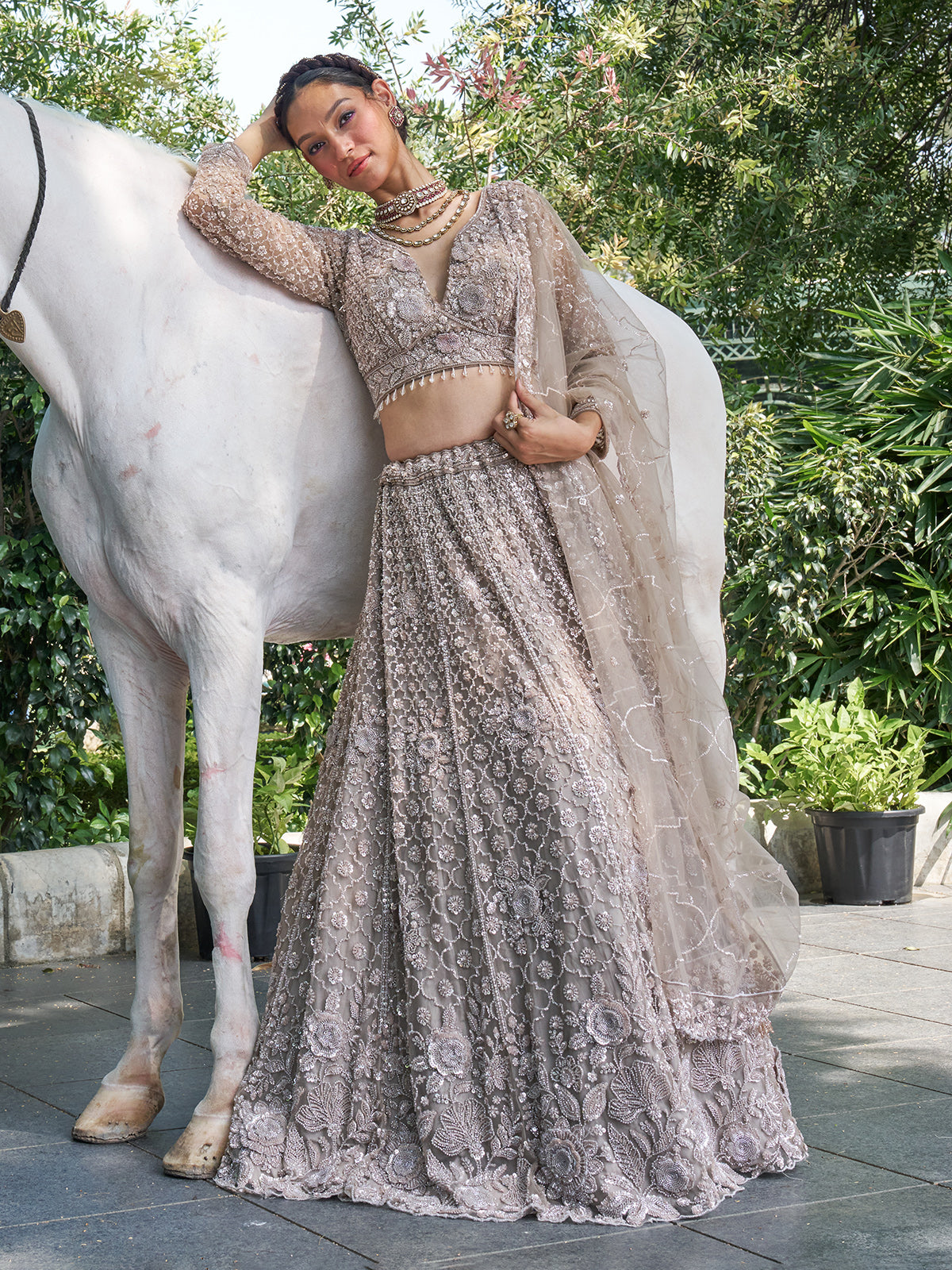 Grey net lehenga choli with sequin, cutdana and floral motifs