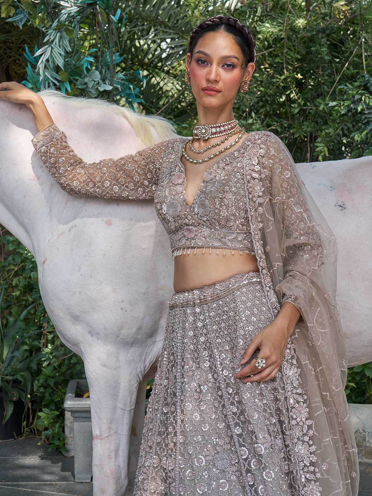 Grey net lehenga choli with sequin, cutdana and floral motifs