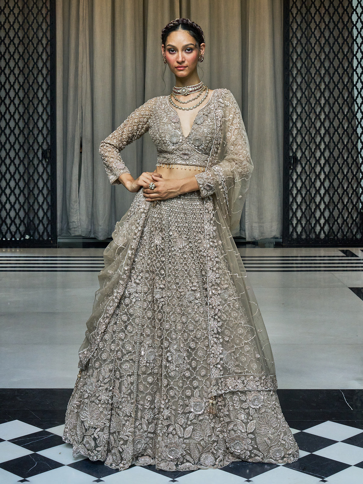 Grey net lehenga choli with sequin, cutdana and floral motifs