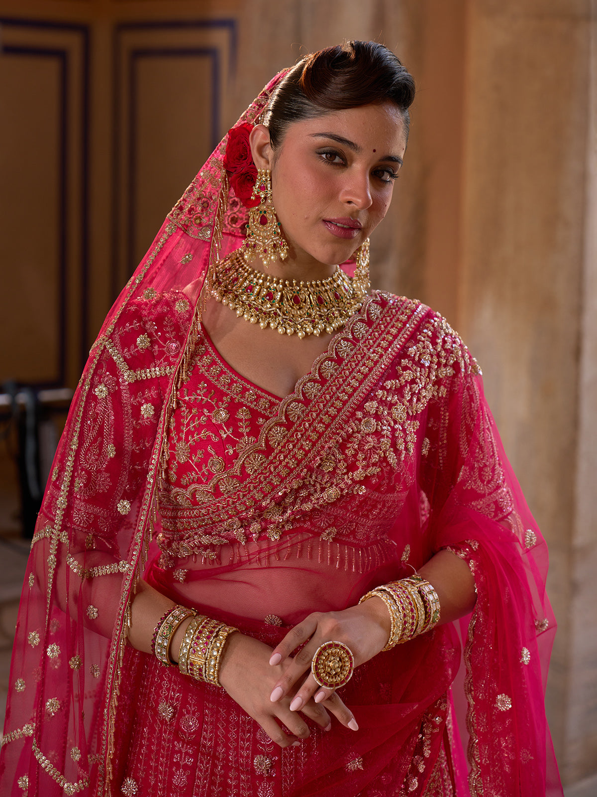 Pink silk net bridal lehenga choli with resham, cutdana and sequin work