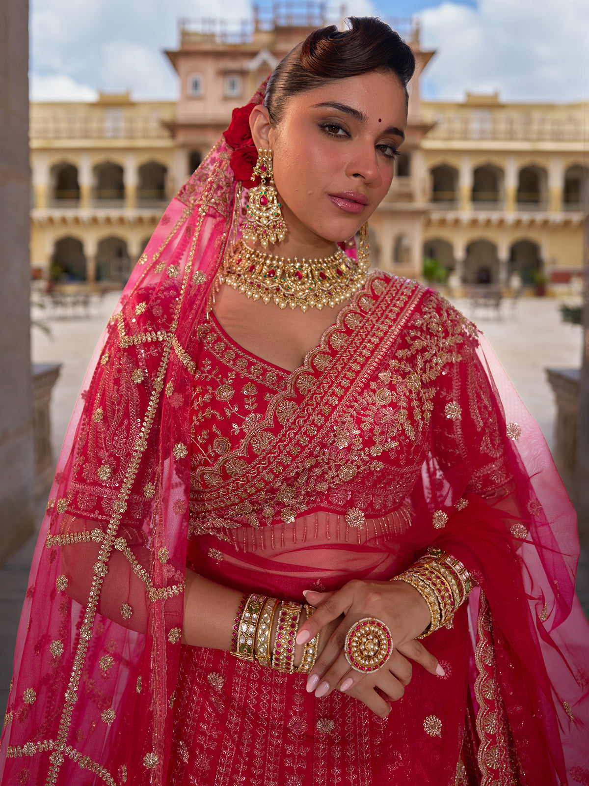 Pink silk net bridal lehenga choli with resham, cutdana and sequin work