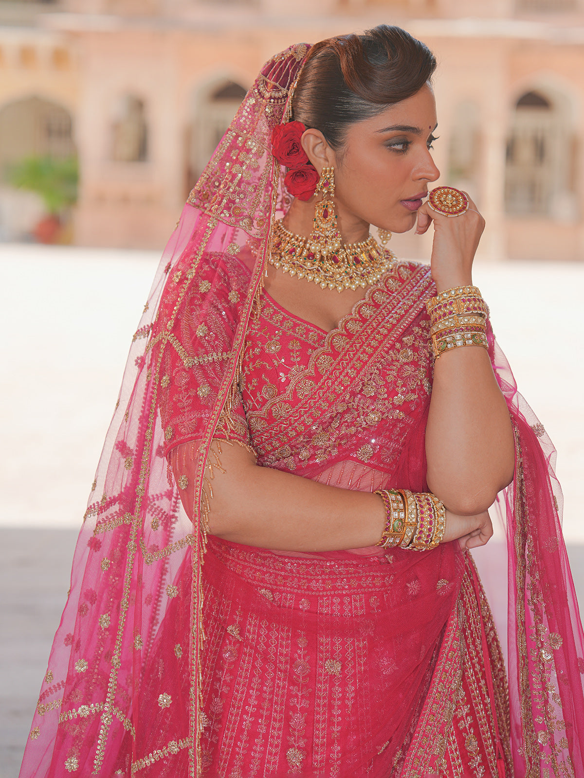 Pink silk net bridal lehenga choli with resham, cutdana and sequin work