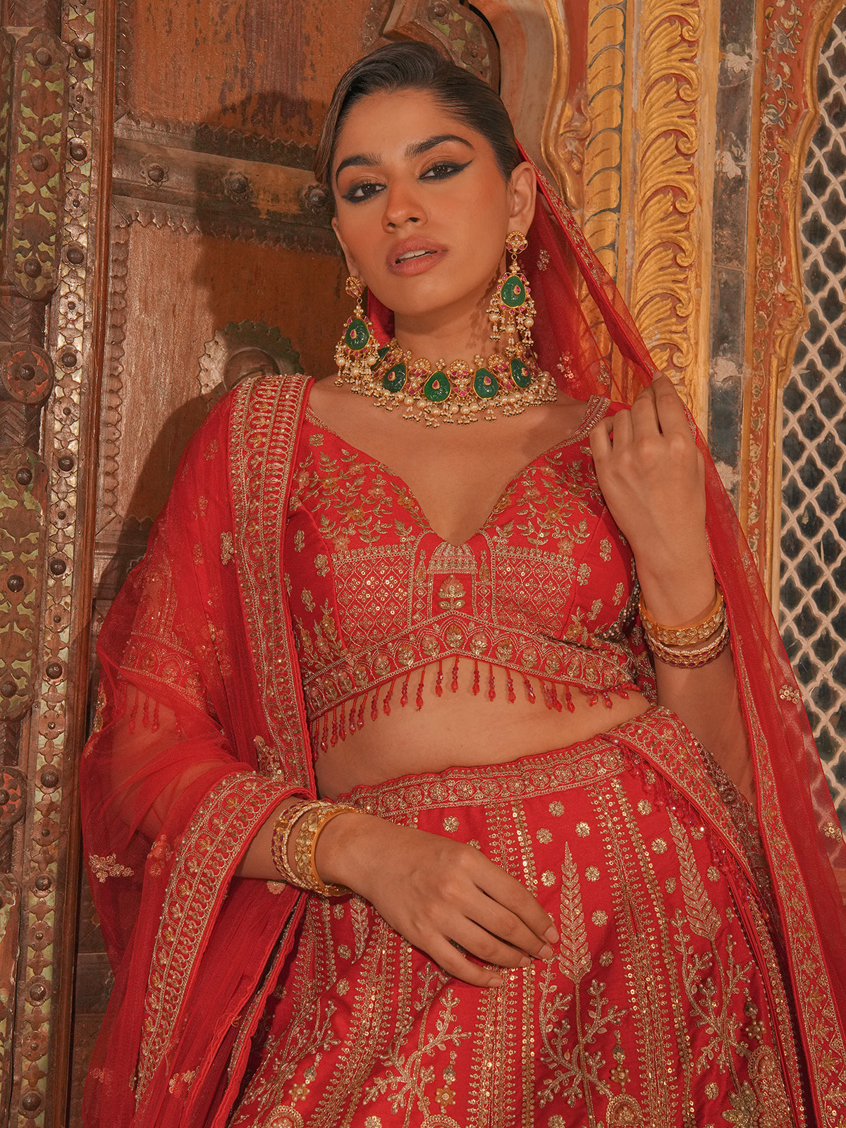 Classic red silk heavy bridal lehenga choli with net dupatta
