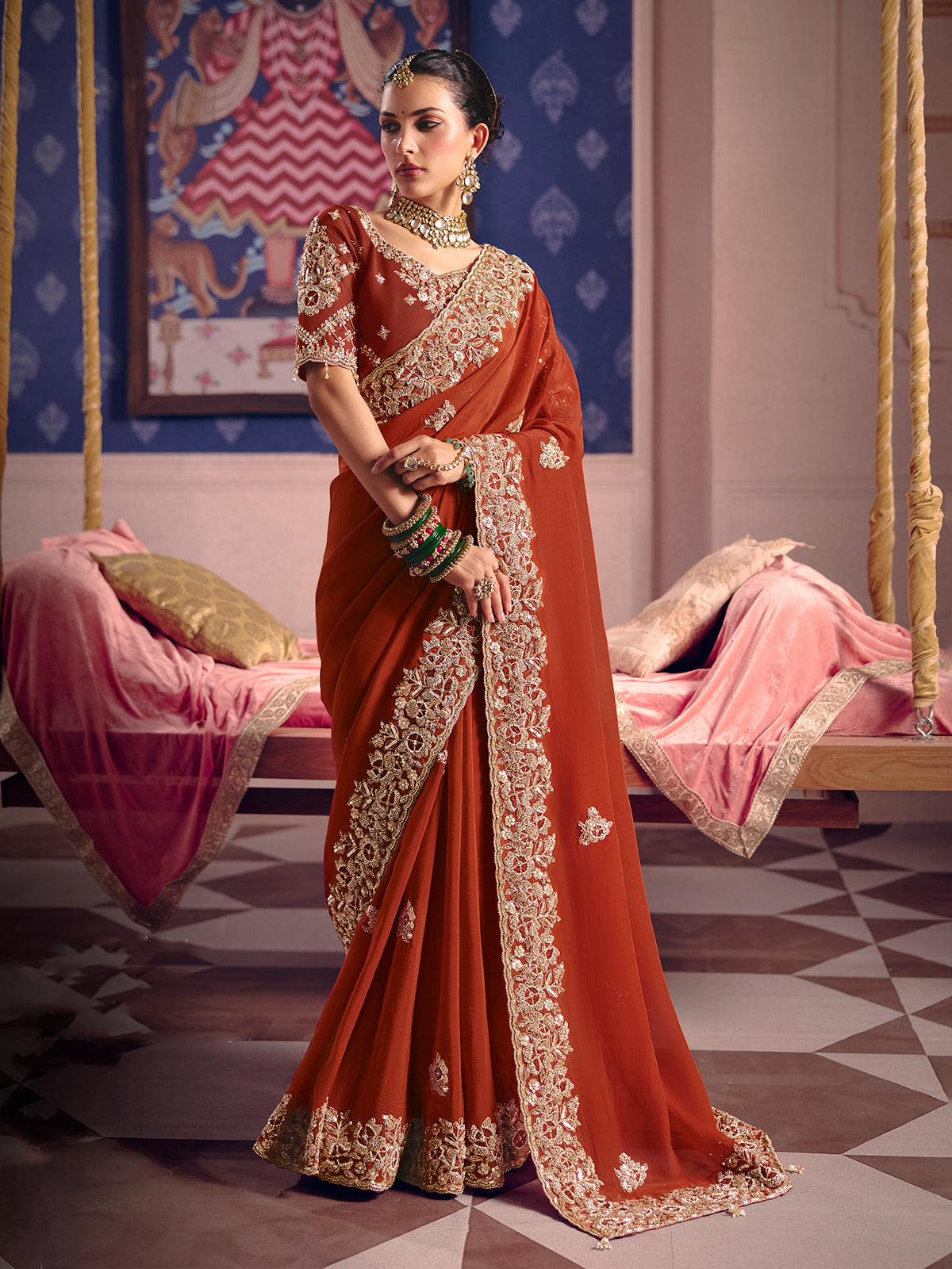 Dusty orange viscose zari tissue saree with embellished border
