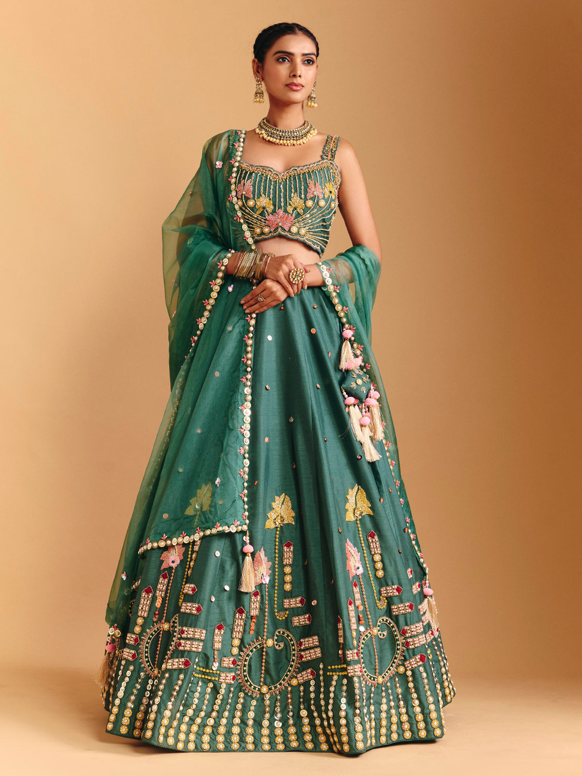Green raw silk lehenga choli with pearl embellishments