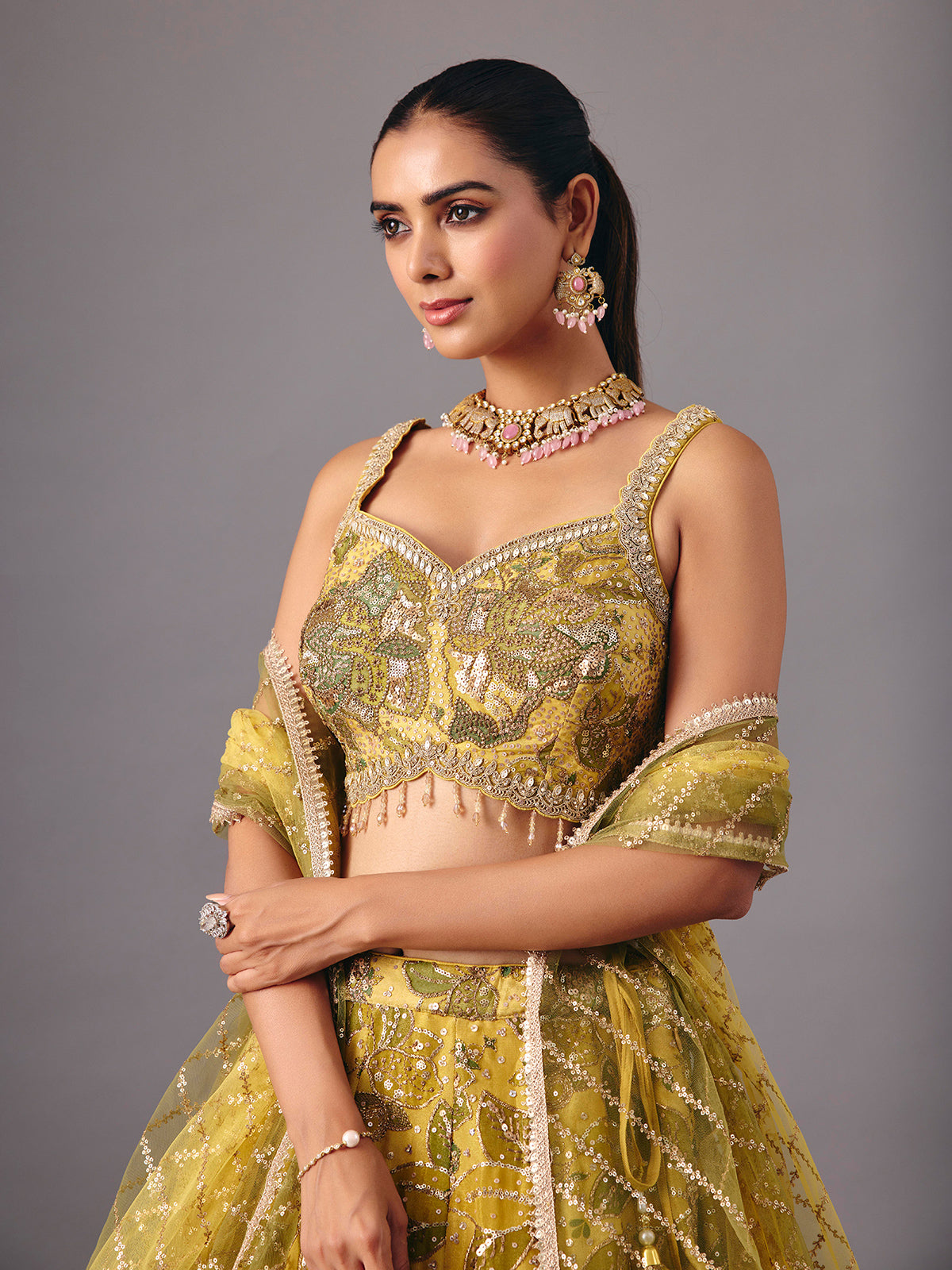 Mehendi yellow georgette silk lehenga choli with embellishments
