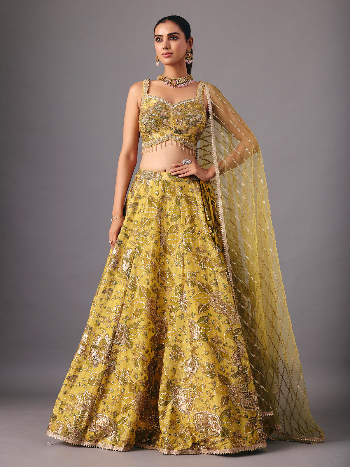 Mehendi yellow georgette silk lehenga choli with embellishments