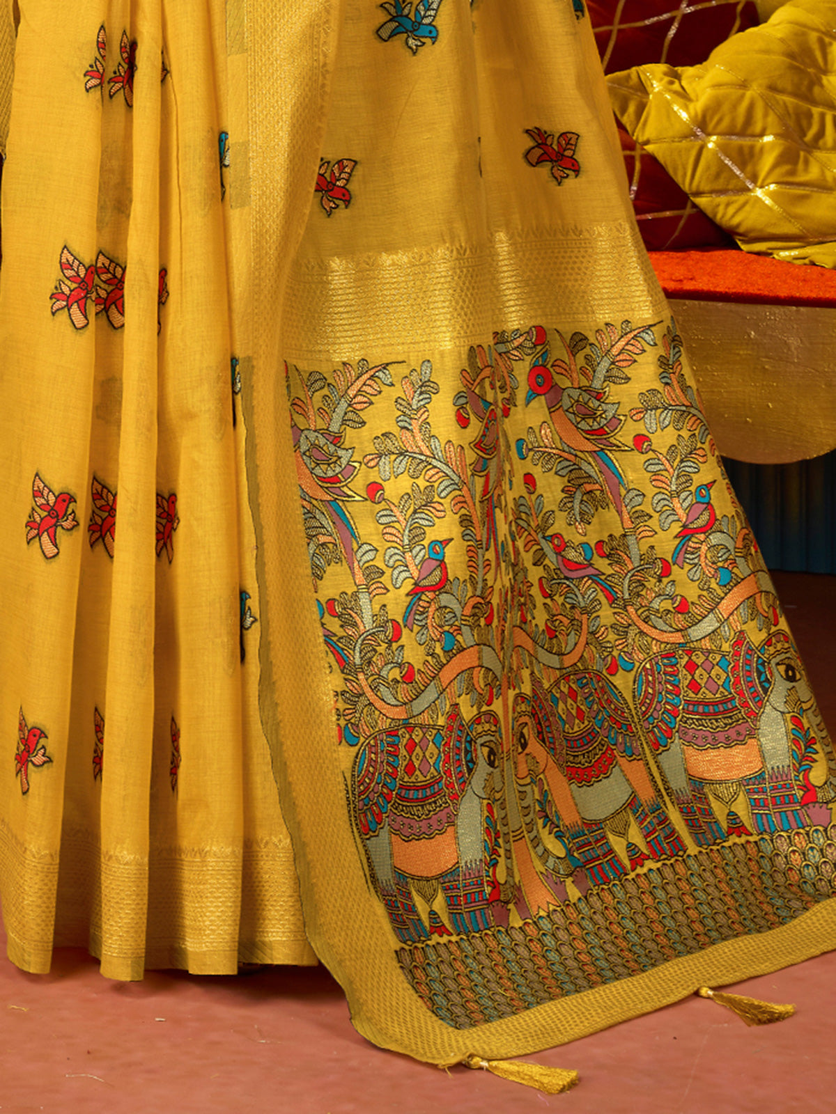 Mustard yellow cotton linen saree with floral zari border